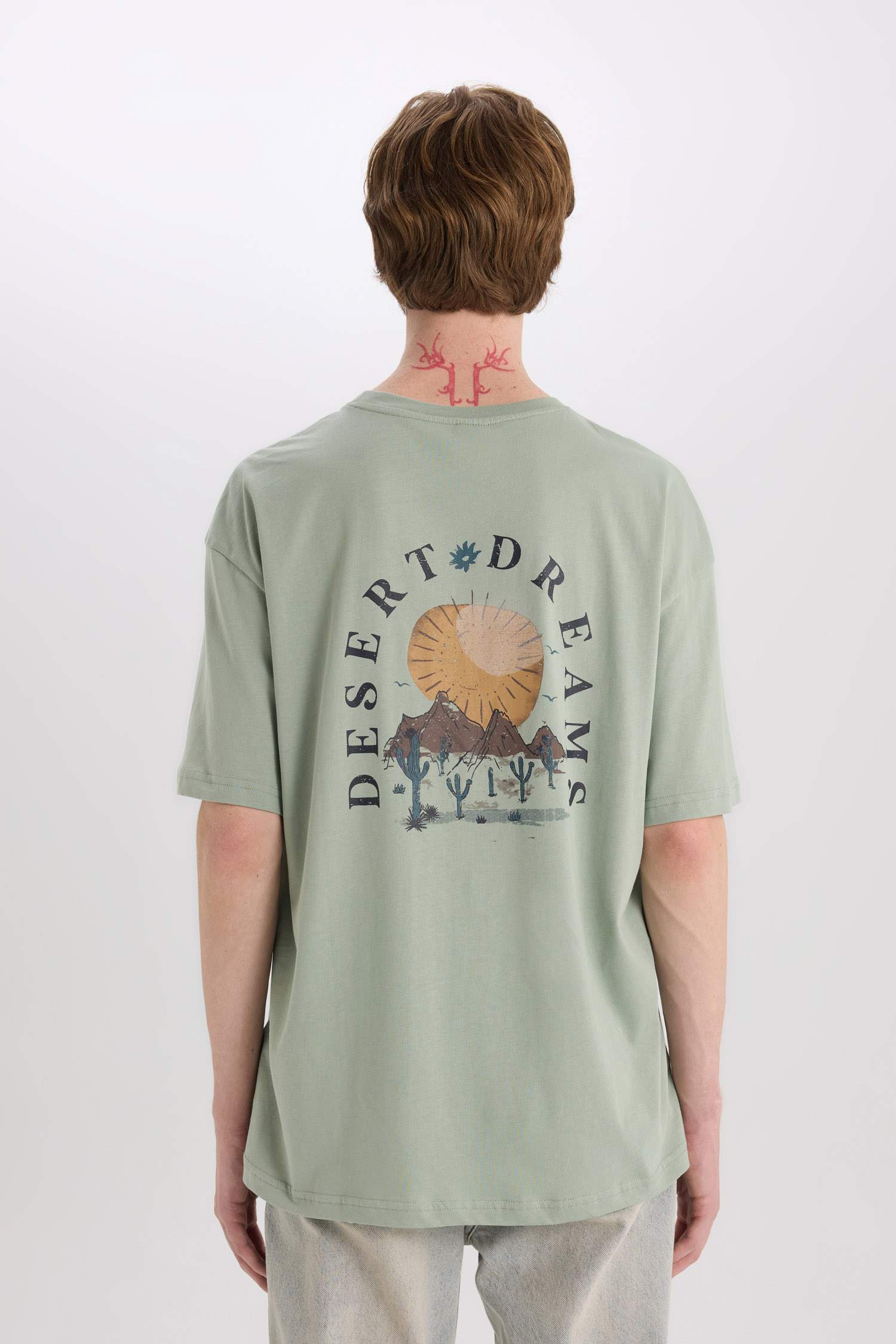 %100 Pamuk Oversize Geniş Kalıp Bisiklet Yaka Sırt Baskılı Kısa Kollu Tişört