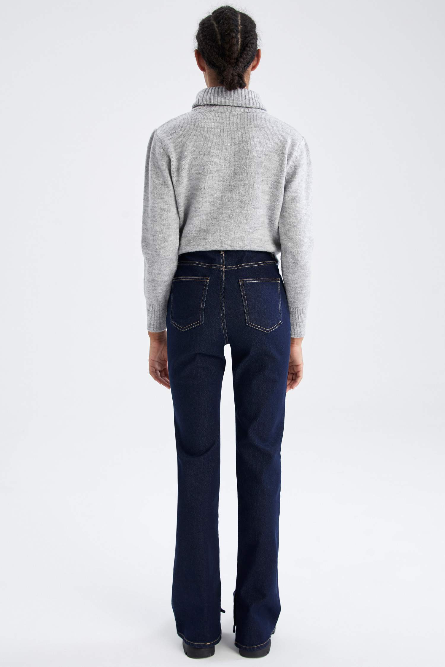 Pantalon en jean fendu à jambe espagnole coupe slim évasée