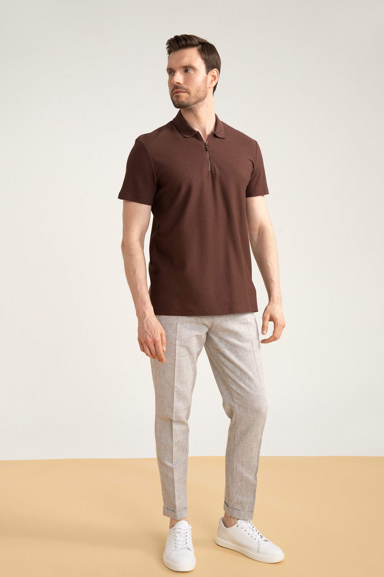 muscle fit zip polo