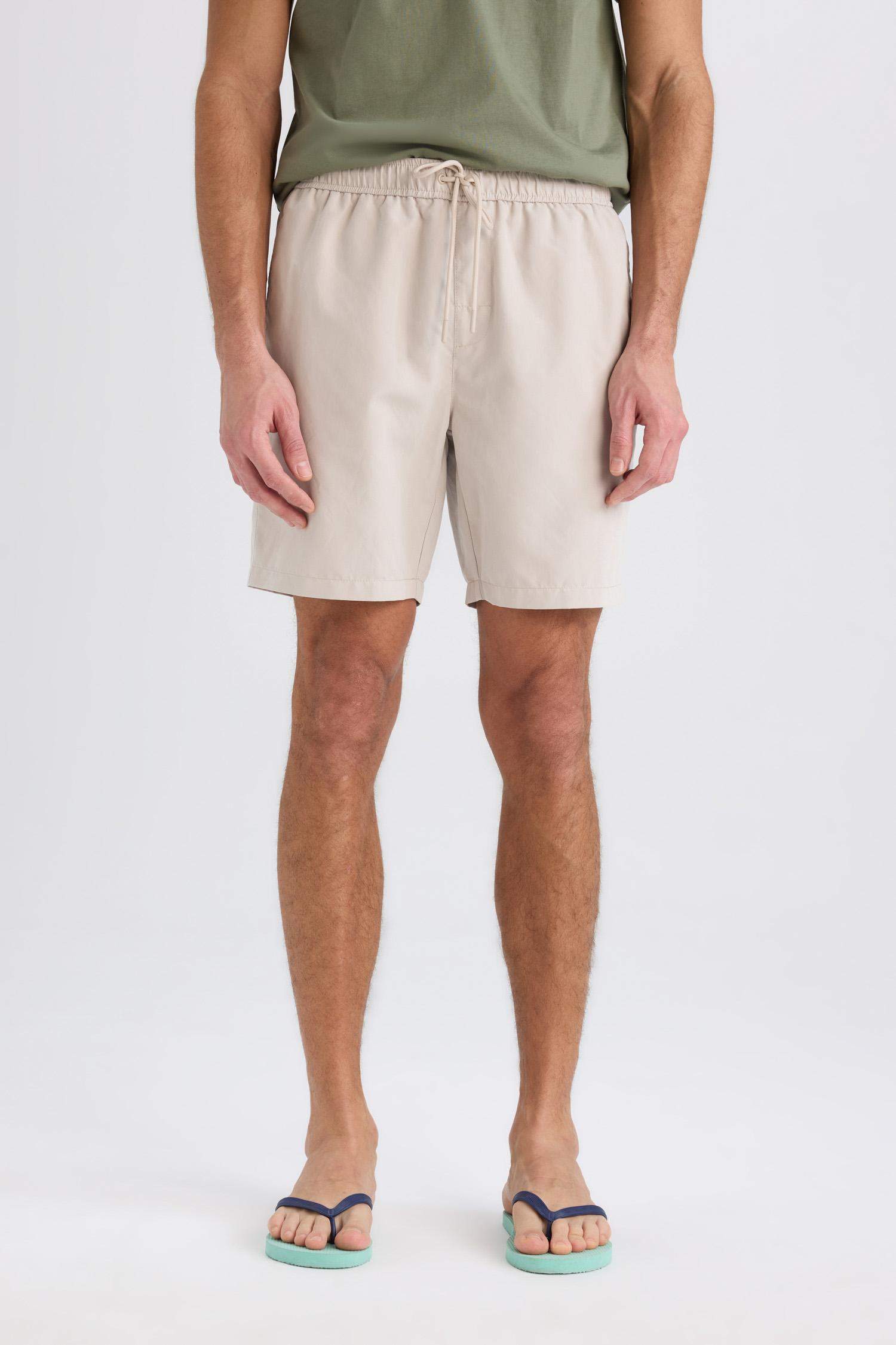 شورت بحر قصير ببطانة شبكية قماش سريع الجفاف