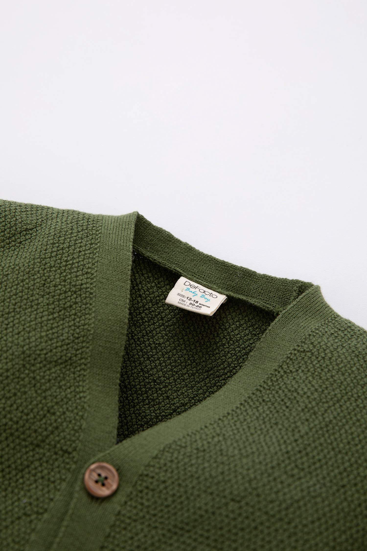 جاكيت قطن قصة عادية بياقة V