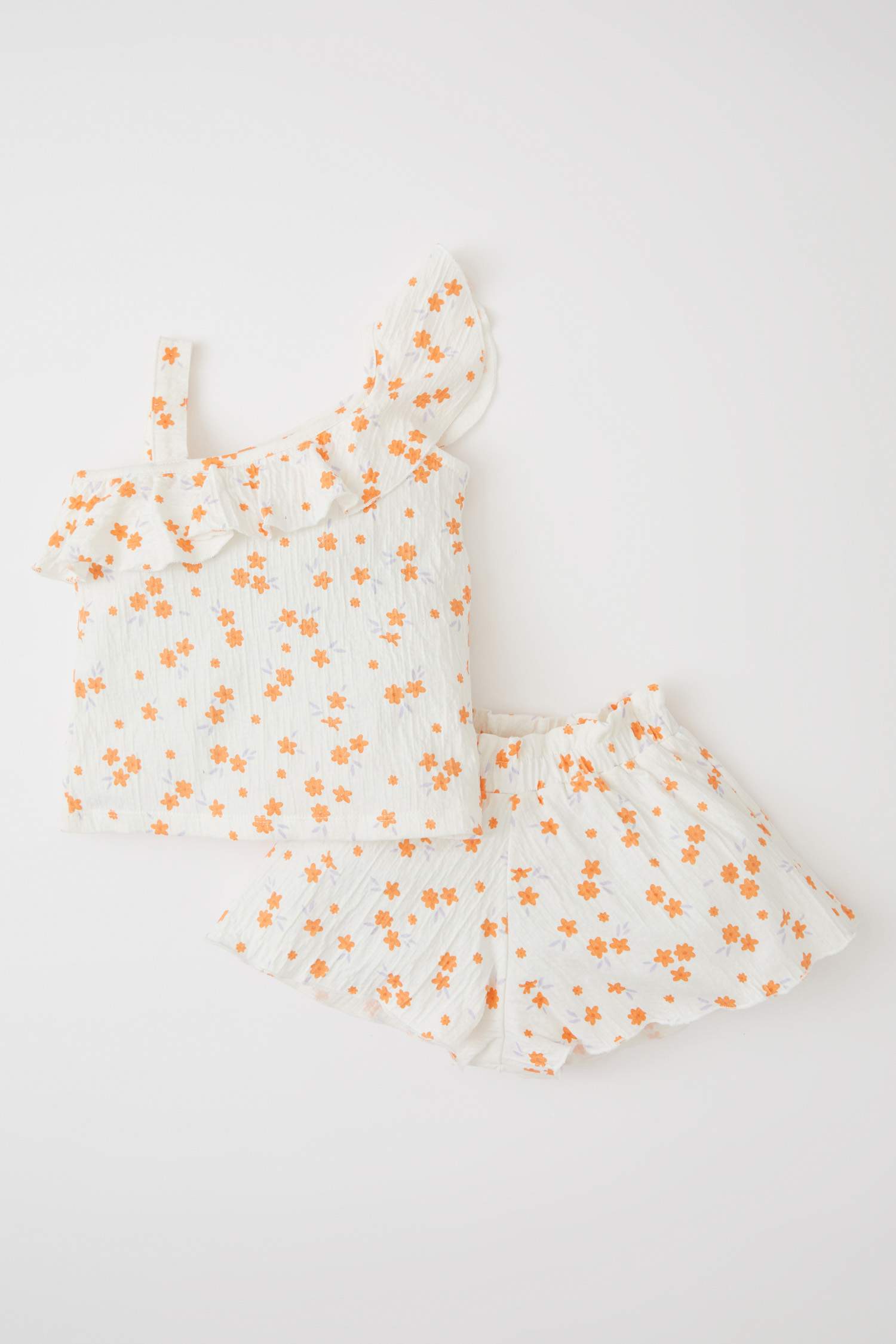 طقم بناتي شورت وبلوزة بكتف واحد بقصة عادية - قطعتين