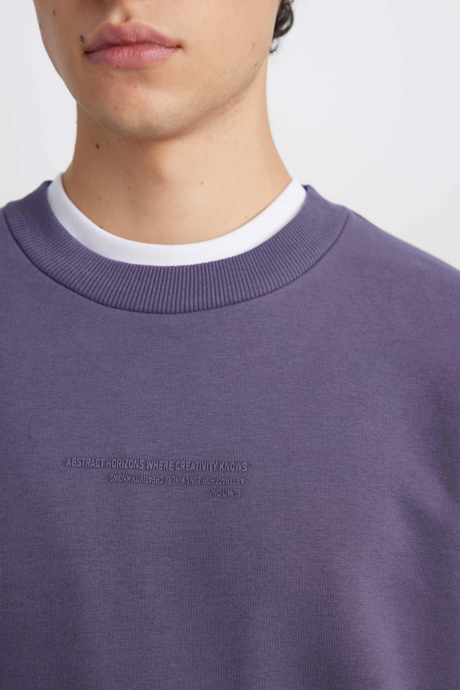 سويت شيرت أوفر سايز بطباعة وياخة مستديرة