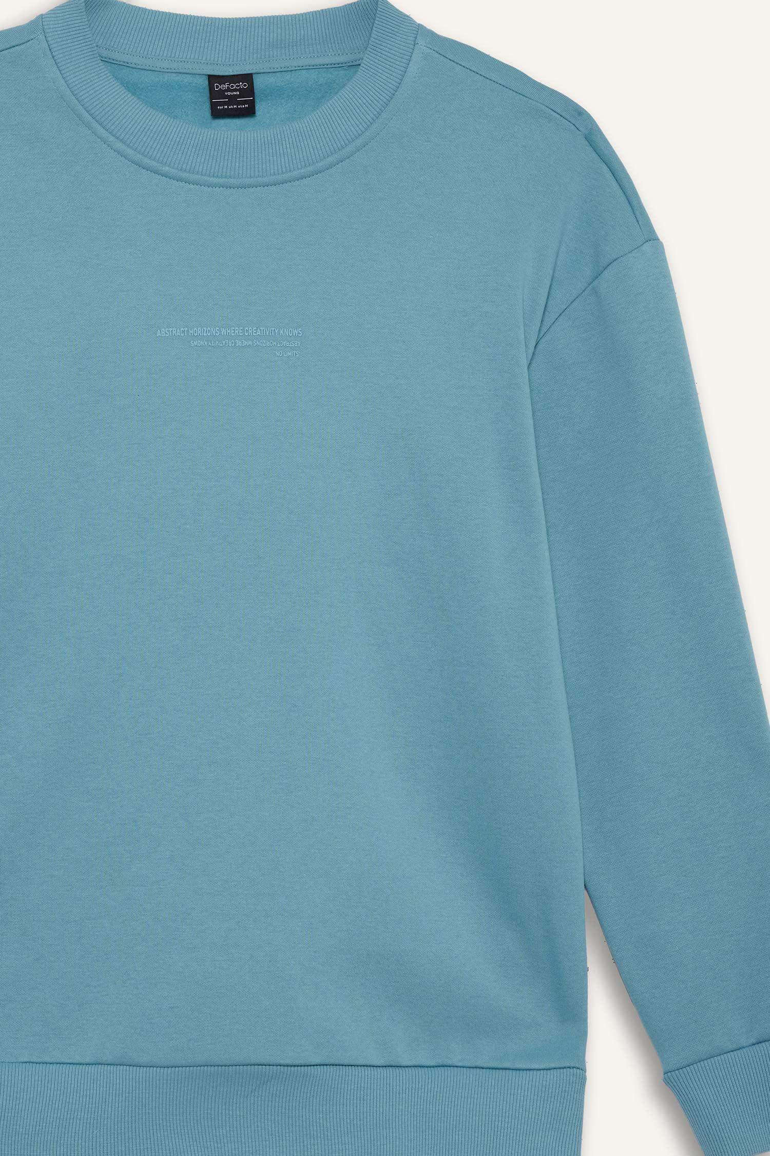 Sweatshirt boxy imprimé à col rond intérieur doux