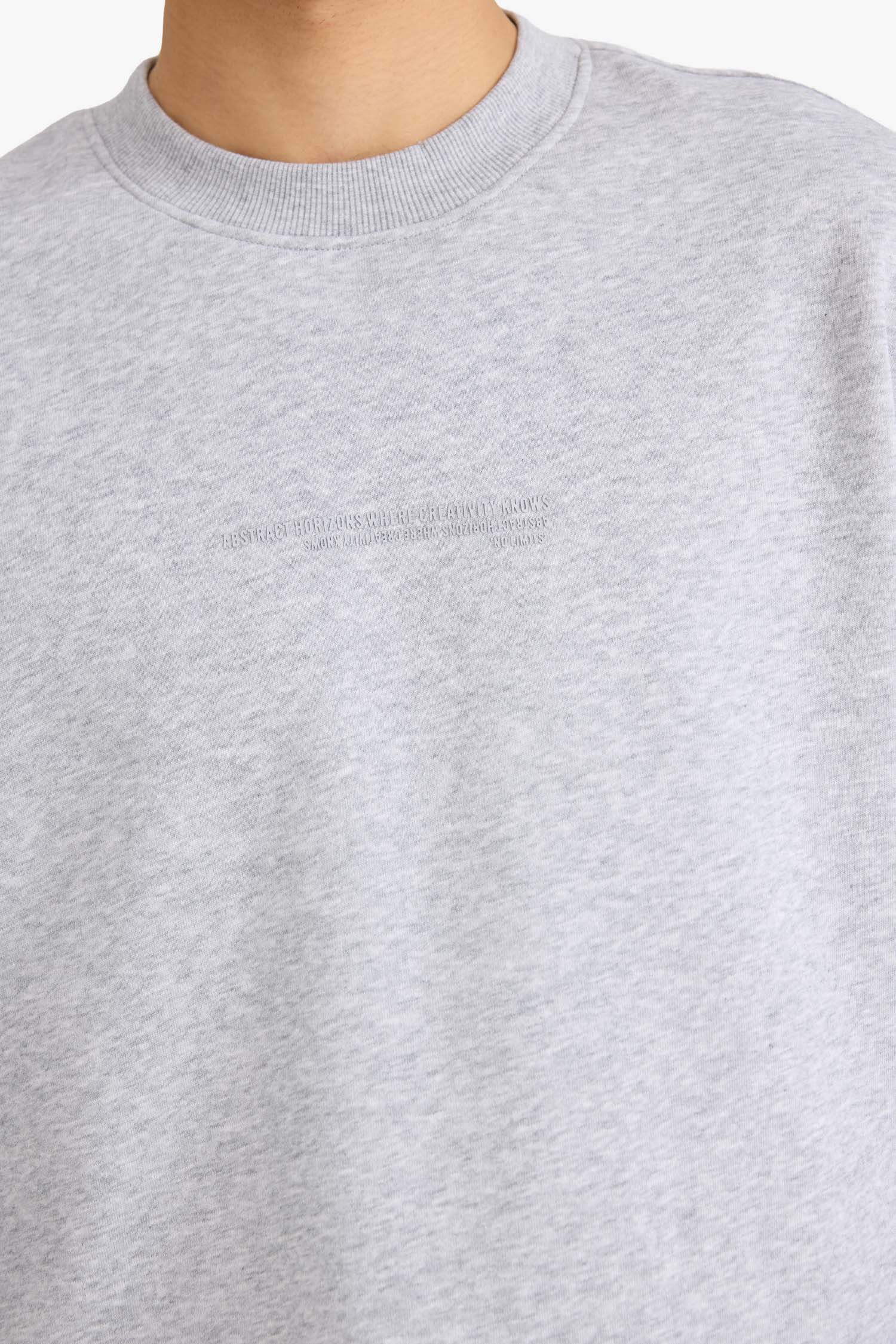 سويت شيرت اوفر سايز بياخة مستديرة