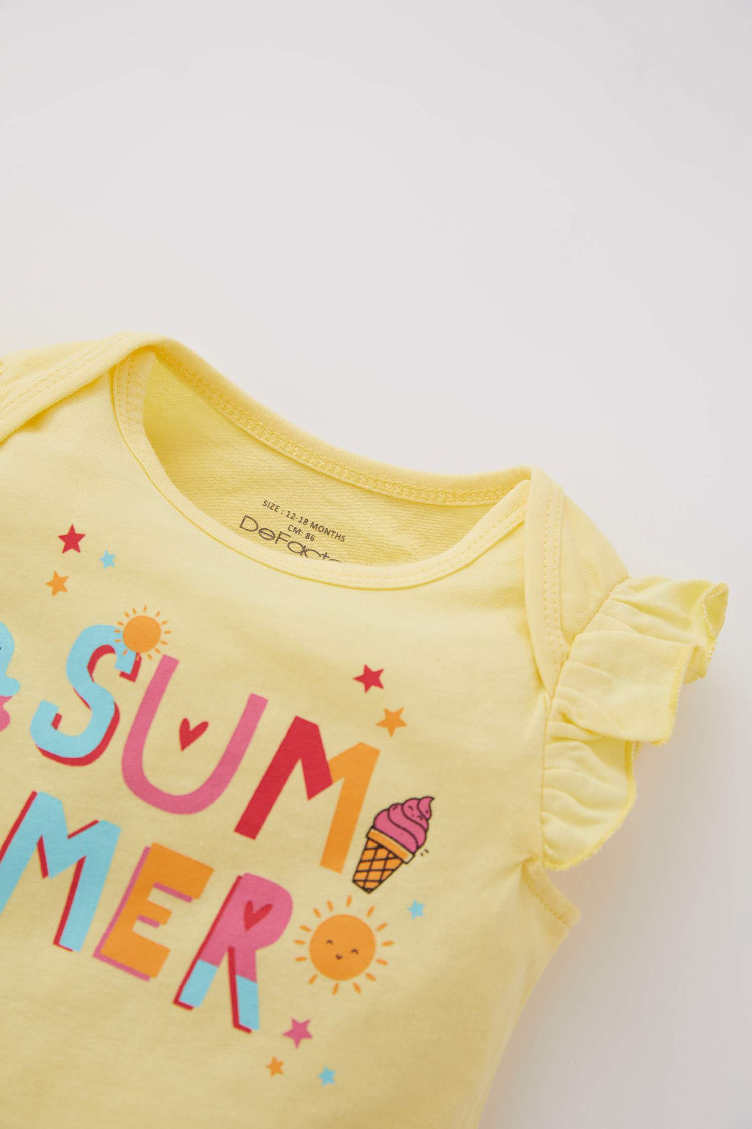 Комбинезон с принтом-слоганом на кнопках из ткани суприм для малышей девочек