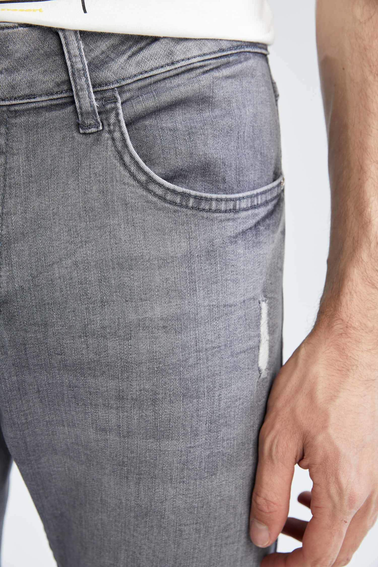Defacto Skinny Comfort Fit Yırtık Detaylı Jean Pantolon. 7