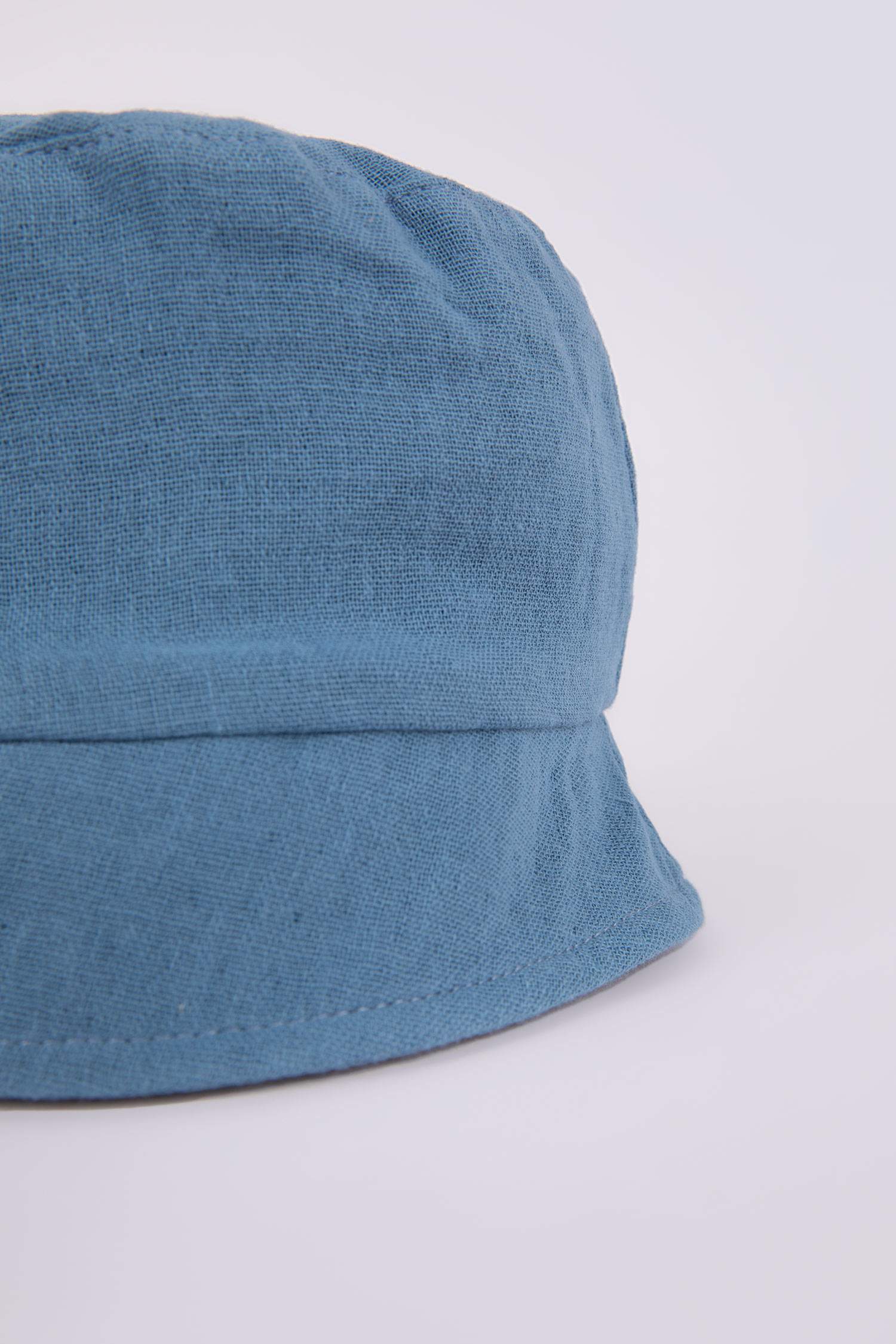 قبعة ولادي حديثي الولادة من الموسلين