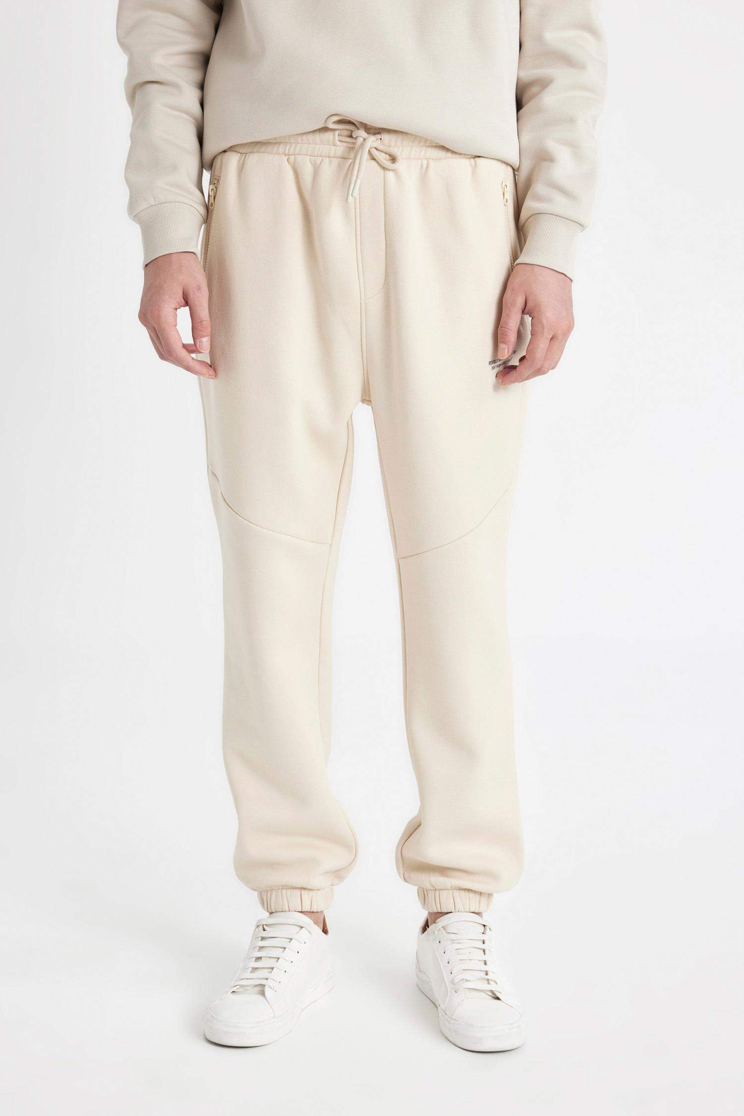 بنطلون بجامة رياضي قصة عادية بجيب ورجل مطاطي