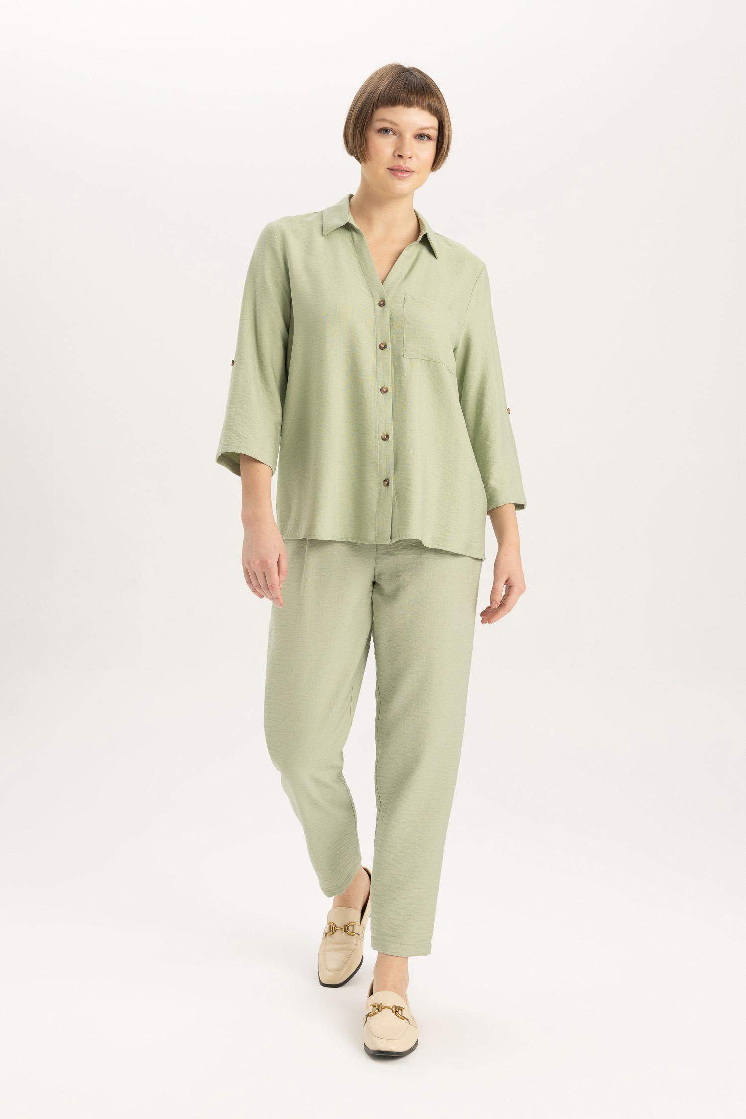 قميص كم طويل قصة عادية