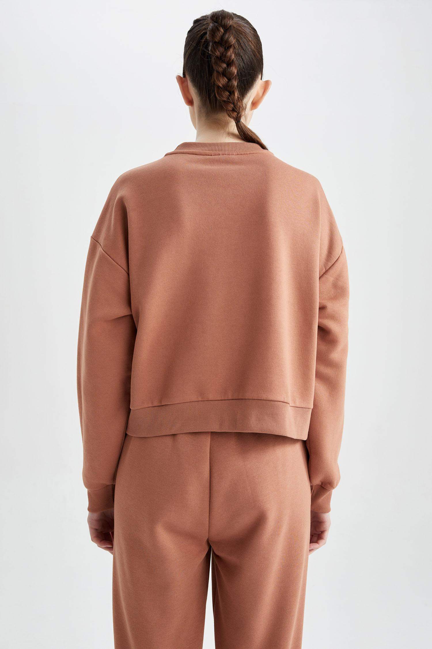 سويت شيرت بياقة مستديرة