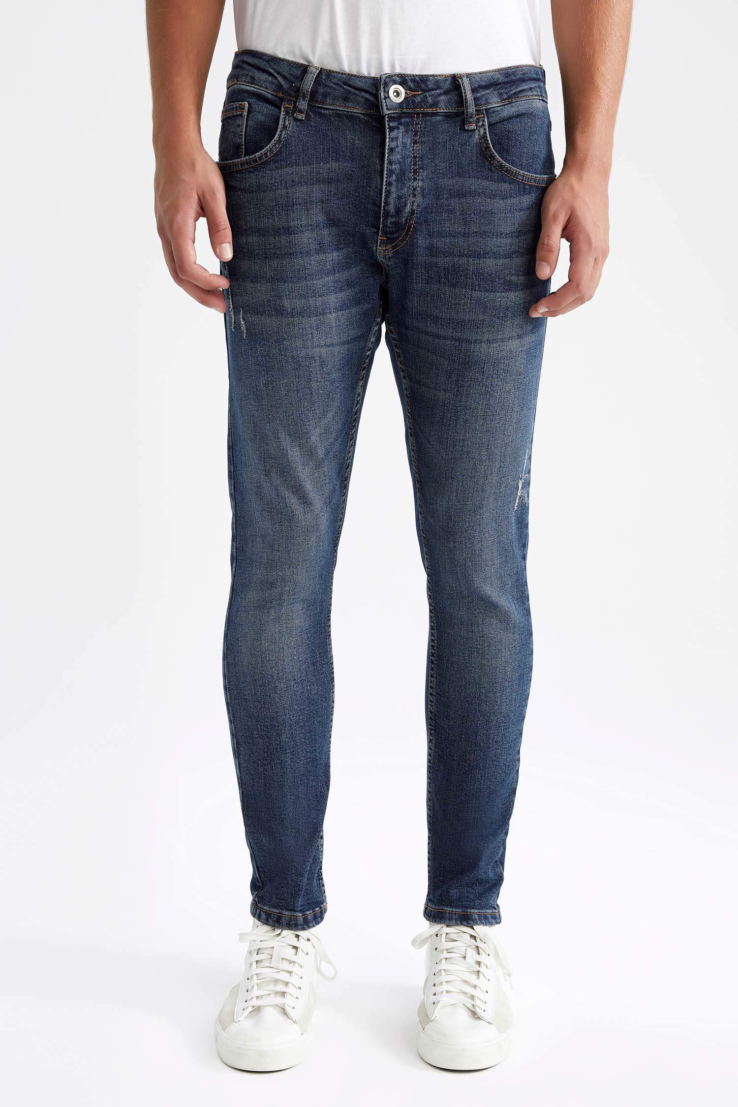 Defacto Skinny Comfort Fit Yırtık Detaylı Jean Pantolon. 1