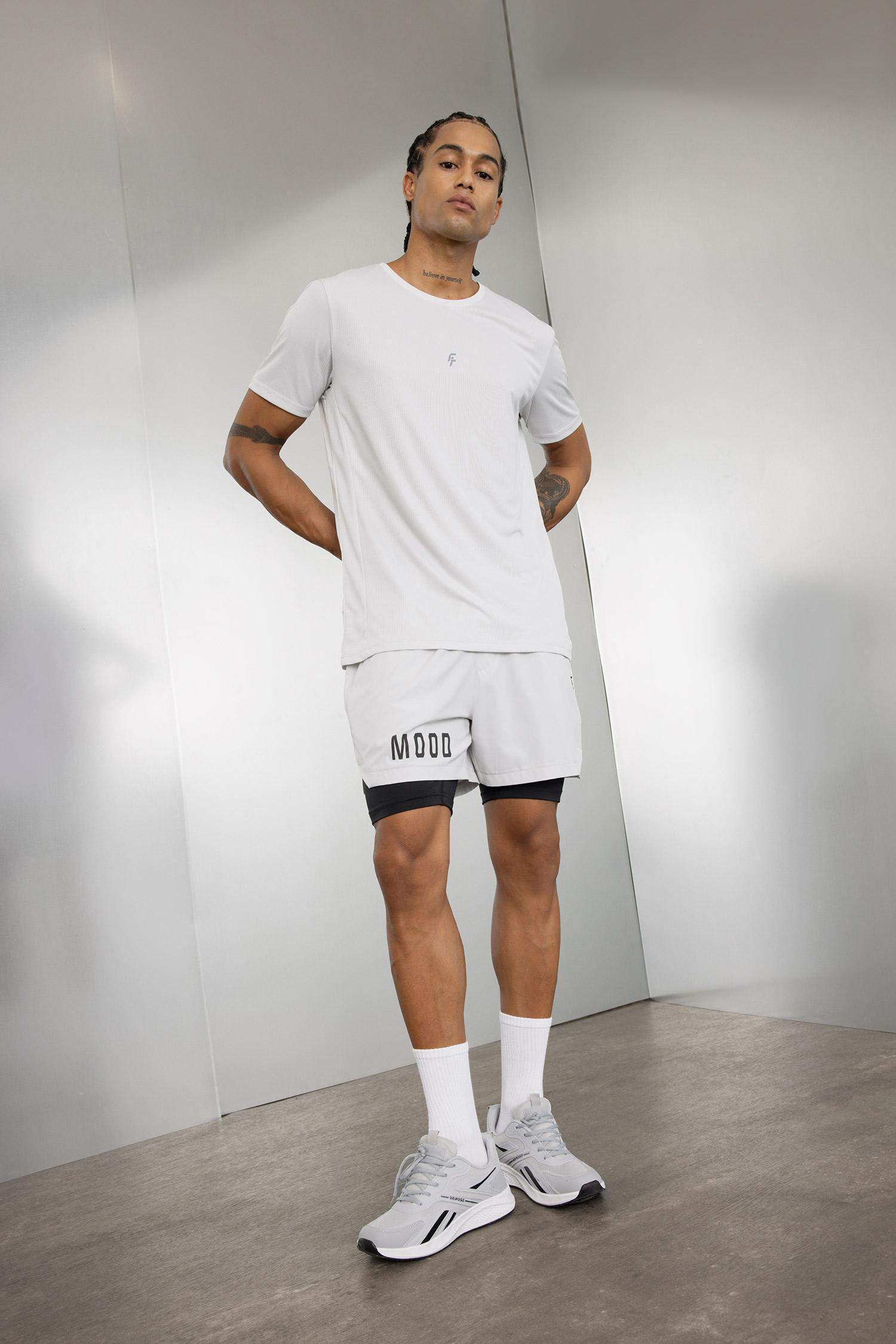 DeFactoFit Slim Fit Dar Kesim Fermuarlı Telefon Cepli Sporcu Taytlı Şort