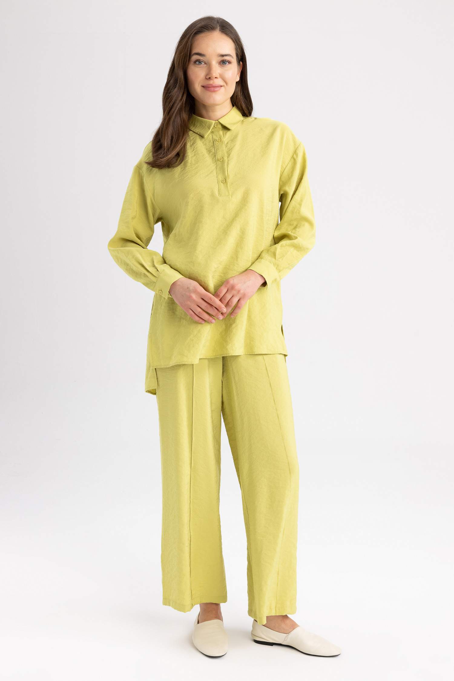 Брюки палаццо с карманами