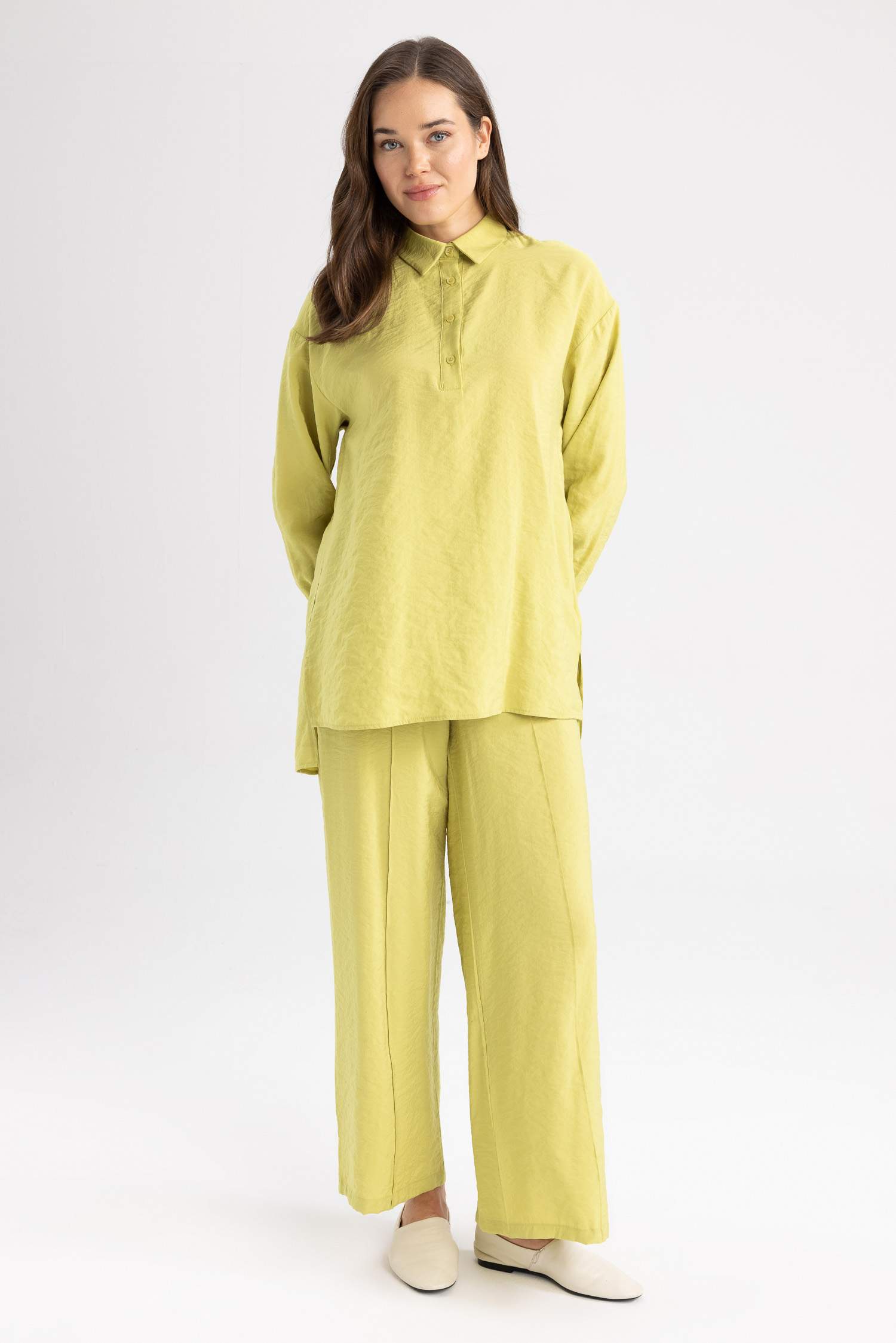 Брюки палаццо с карманами