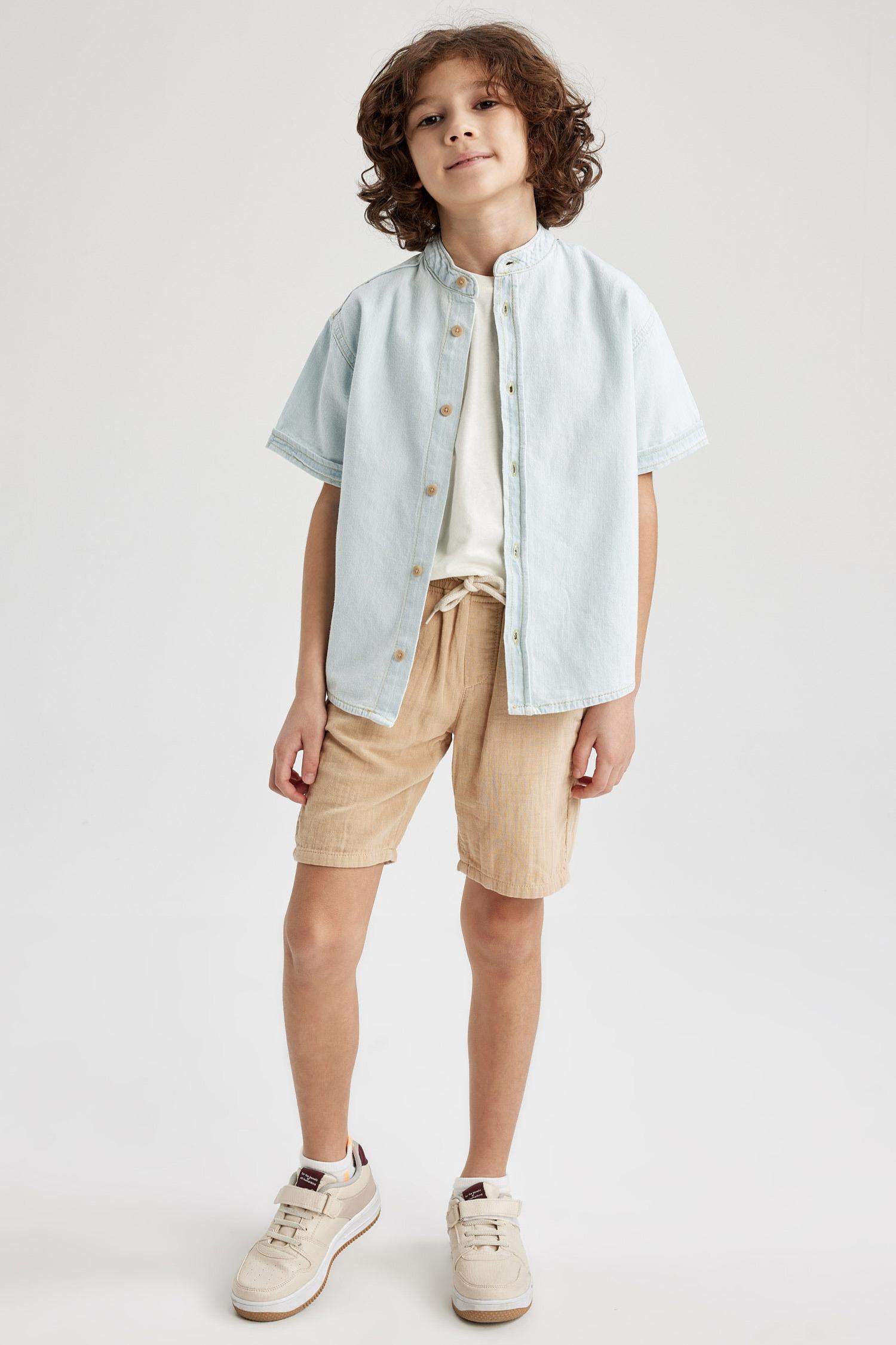 قميص جينز اوفر سايز وياقة بأزرار