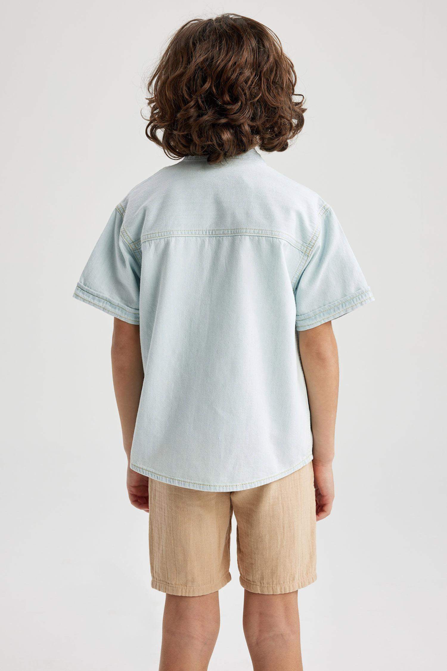 قميص جينز اوفر سايز وياقة بأزرار