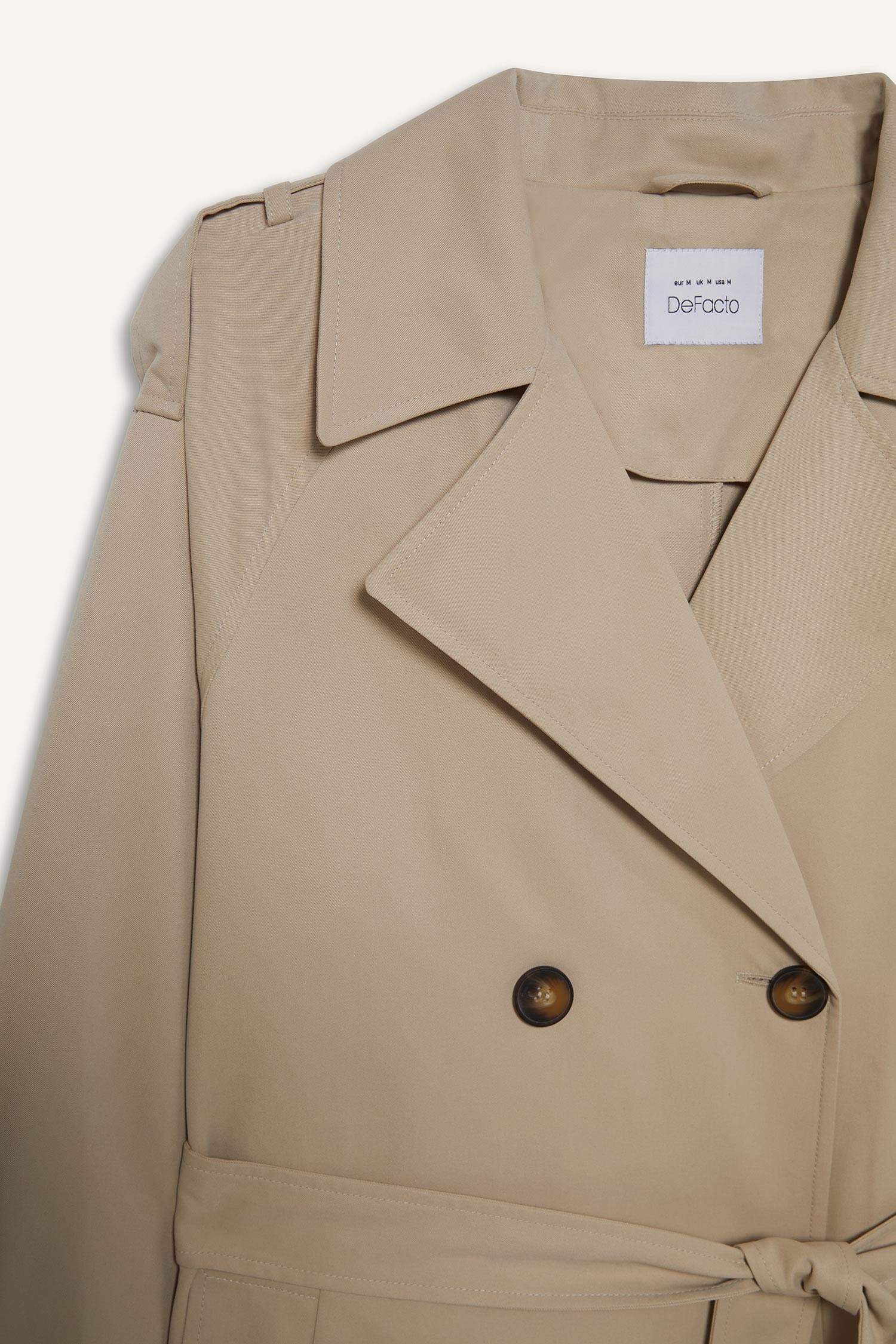 	Su İtici Oversize Geniş Kalıp Uzun Trençkot Kruvaze Yaka Düğmeli Cepli Kol Ucu Katlamalı Rüzgarlık Detaylı Mevsimlik