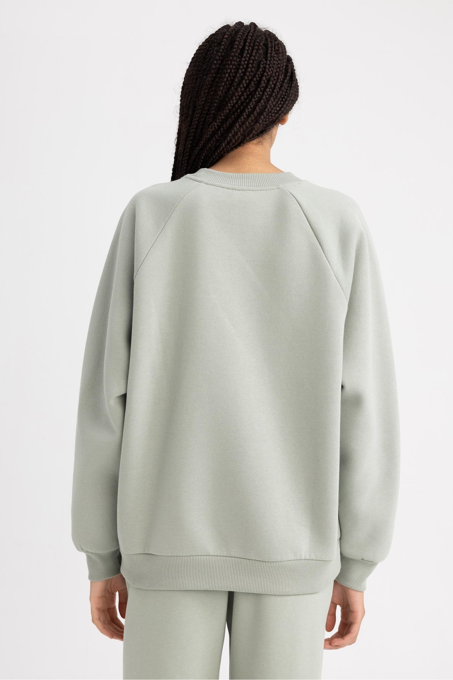 سويت شيرت اوفر سايز بياقة مستديرة