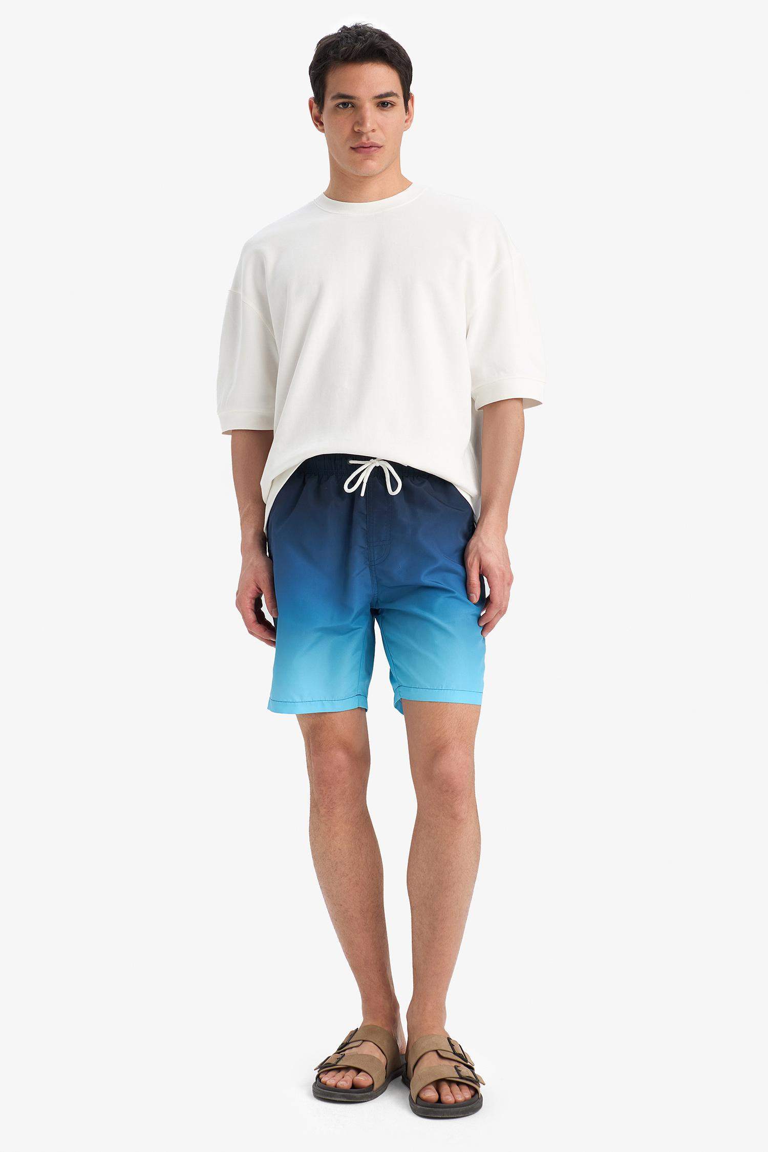 Short de bain au-dessus du genou avec doublure en filet Coupe régulière