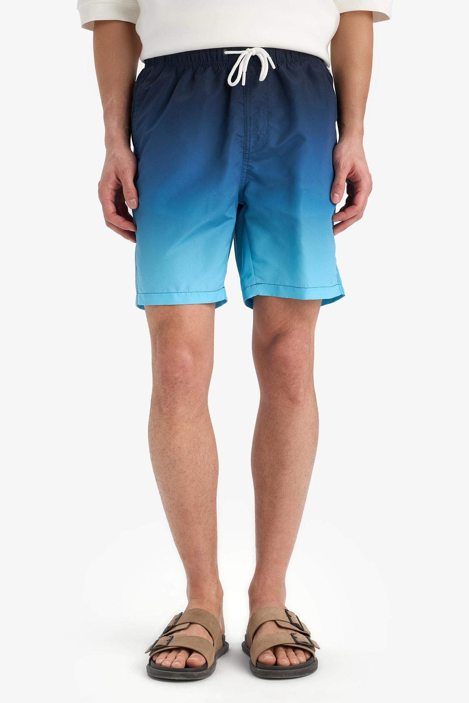 Short de bain au-dessus du genou avec doublure en filet Coupe régulière