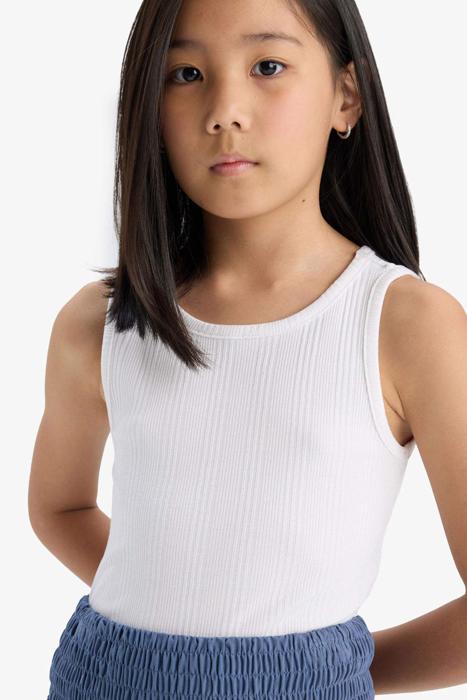 فانيلة بيزك سليم فيت بدون كم بياقة مستديرة