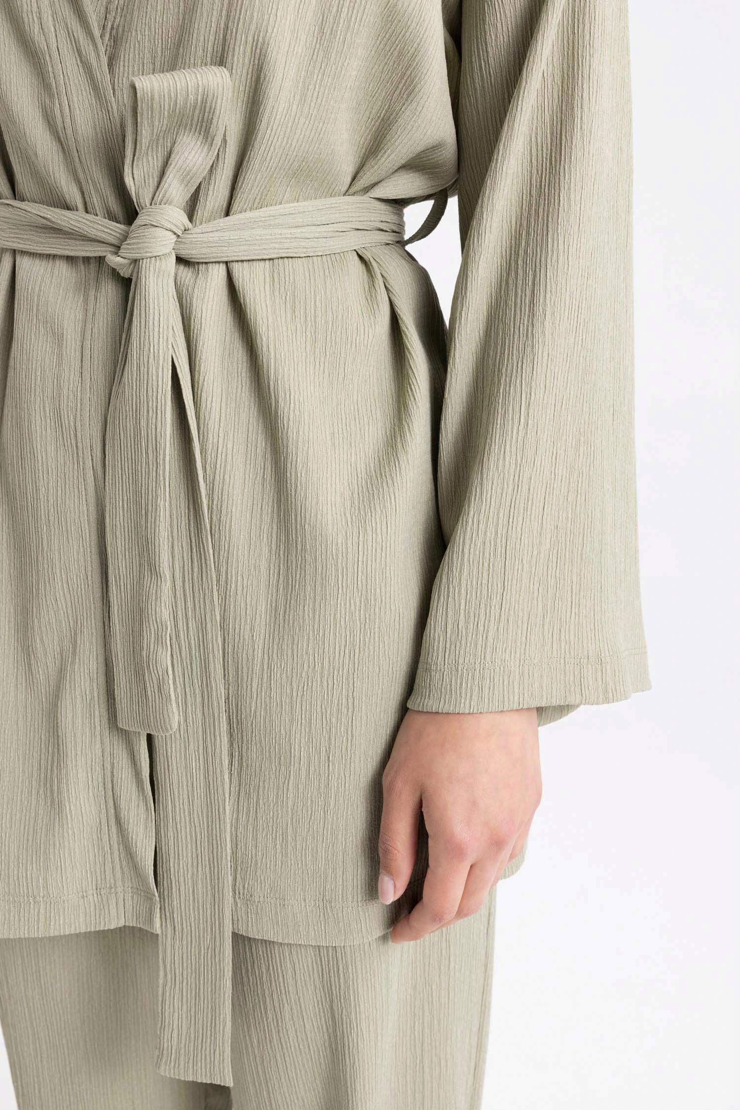 جاكيت منسوج قصة مريحة وياخة شال