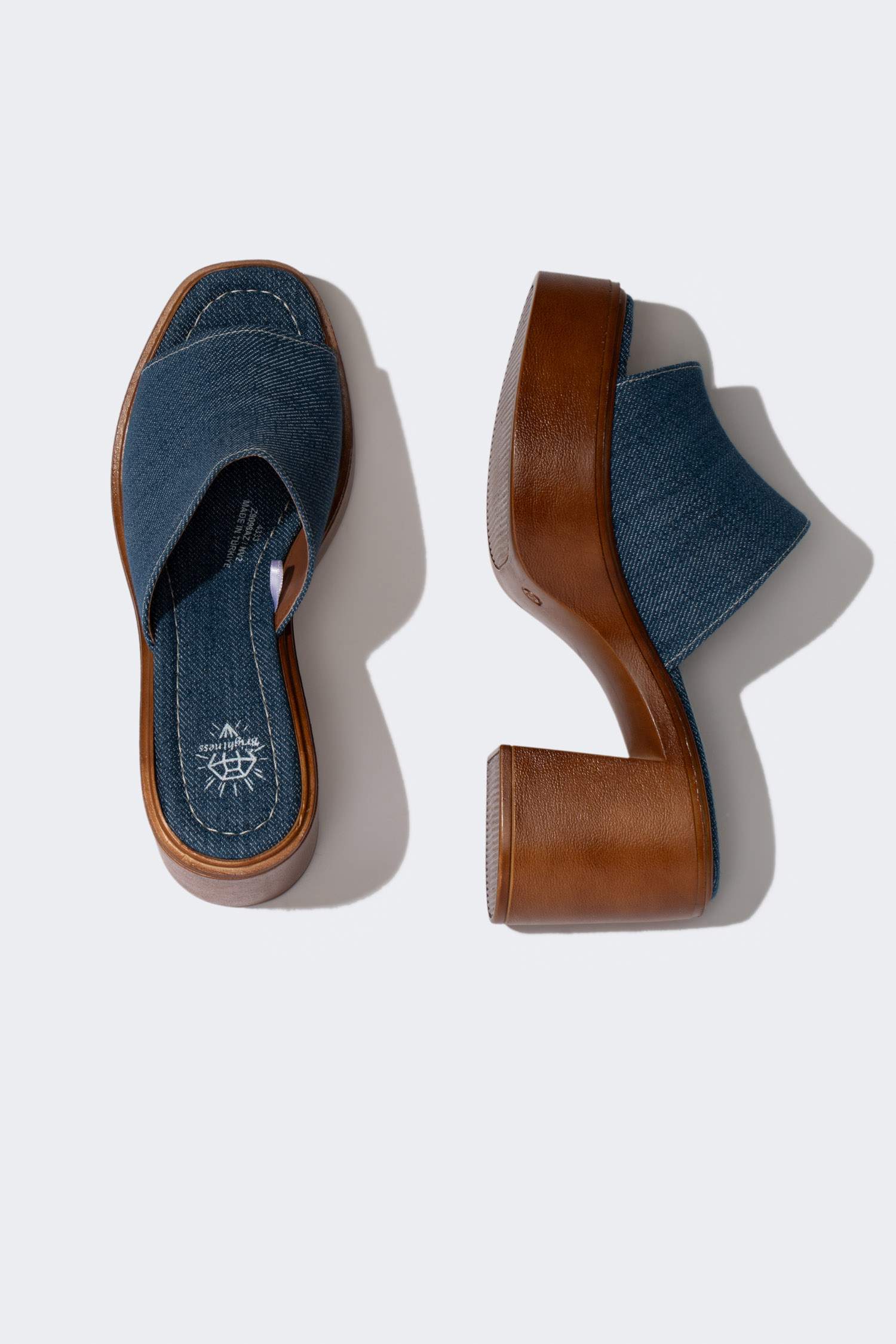 شبشب نسائي جلد صناعي بكعب سميك