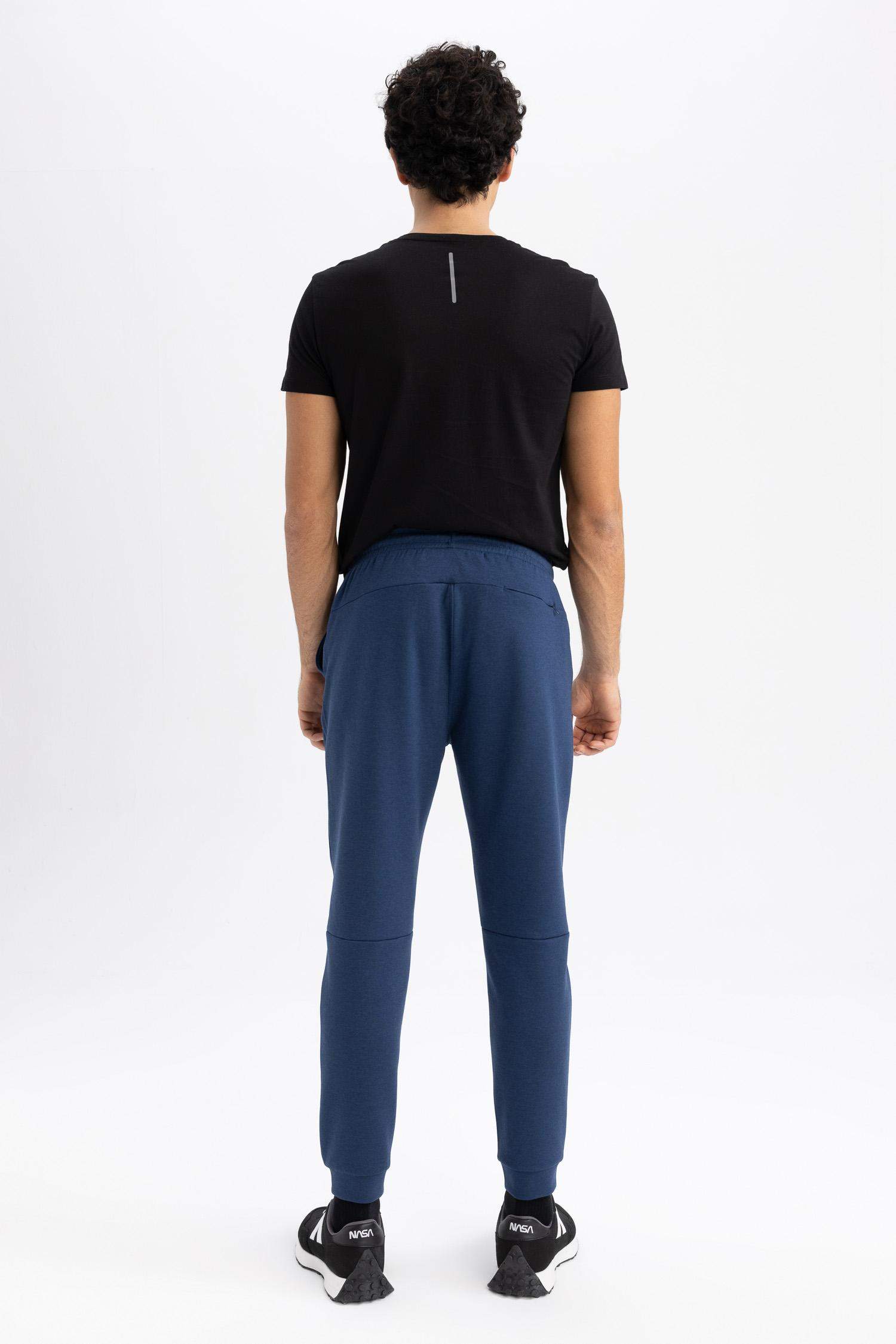 DeFactoFit Slim Fit Sporcu İnce Jogger Eşofman Altı Dar Kesim Skuba Dalgıç Kumaş Standart Paça Beli Bağcıklı Lastikli Paça