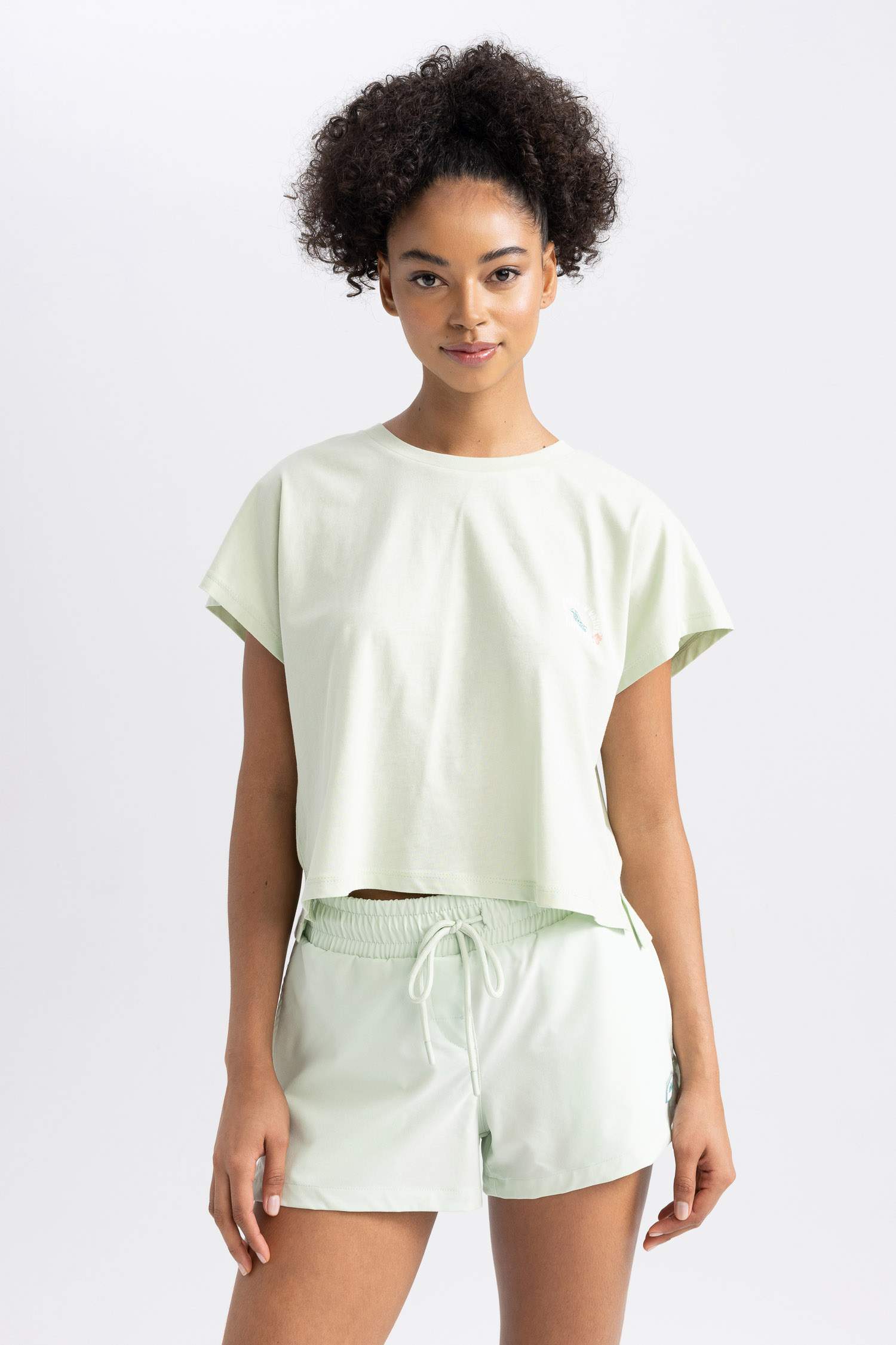 تيشيرت قطن مطبوع واسع برقبة مستديرة