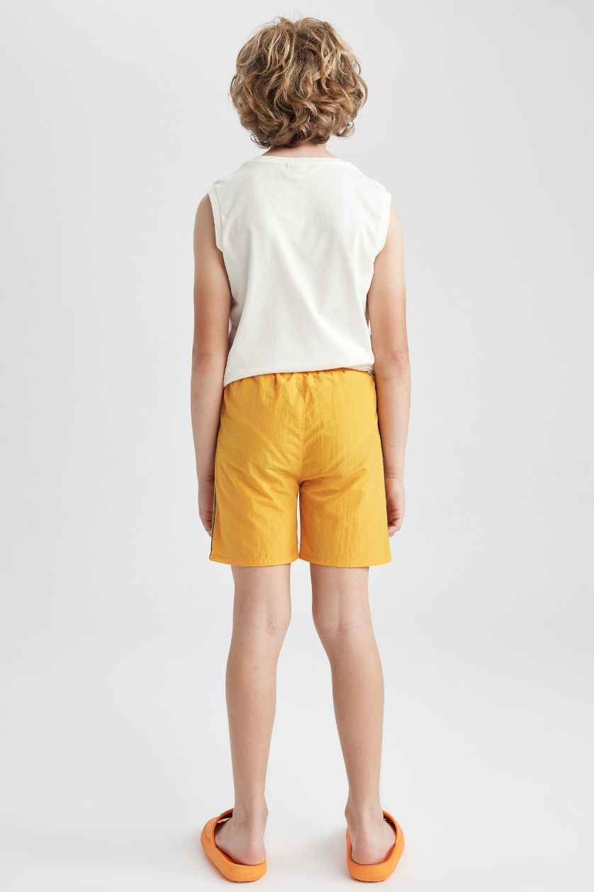 أولاد أصفر شورت بحر ولادي