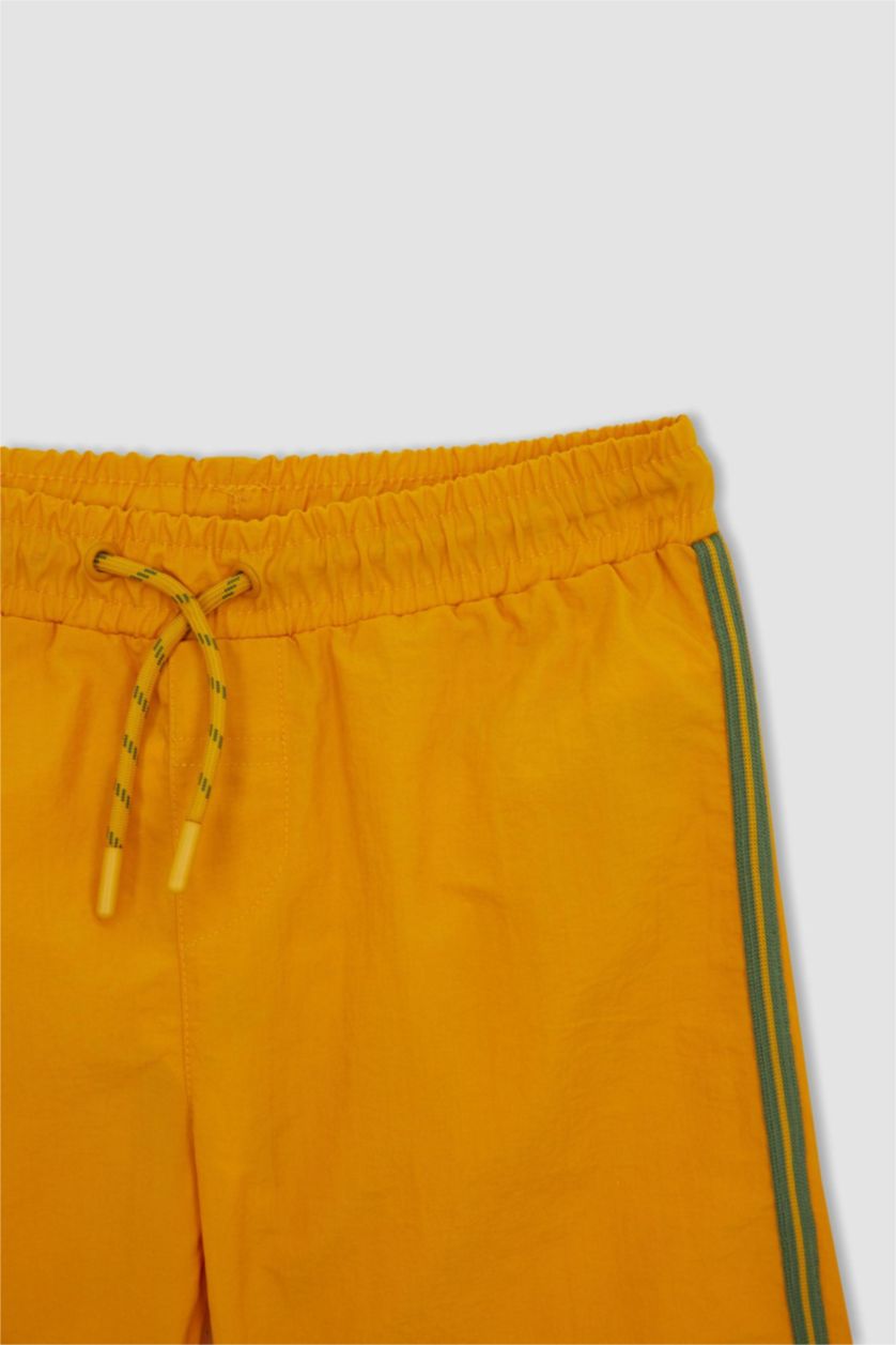 أولاد أصفر شورت بحر ولادي