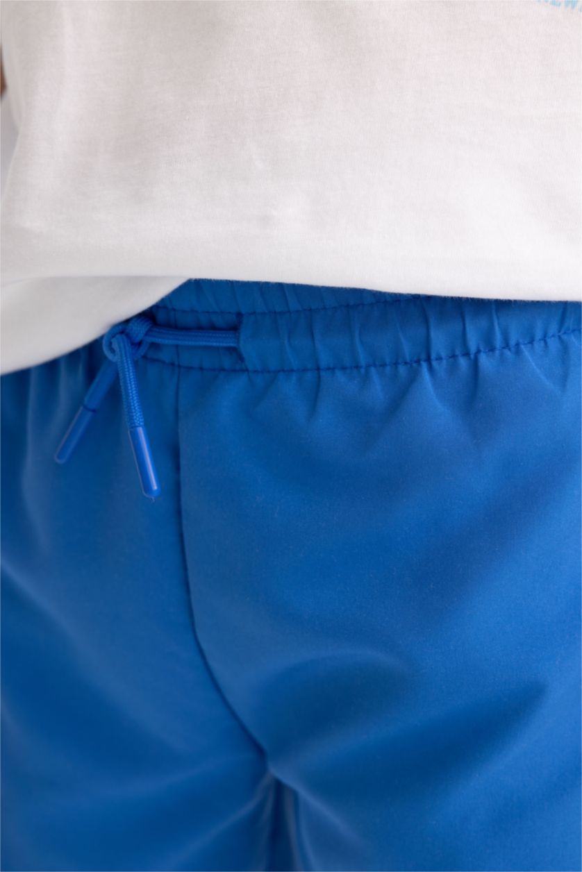 BOYS & TEENS Indigo Boy Water-Changing Swimming Shorts