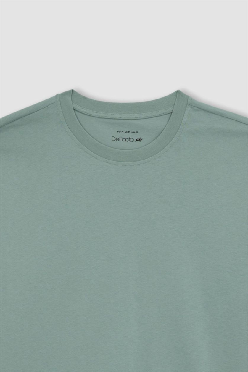 رجال أخضر فاتح تي شيرت نص ردن اوفر سايز مطبوع بياخة مستديرة من DeFactoFit