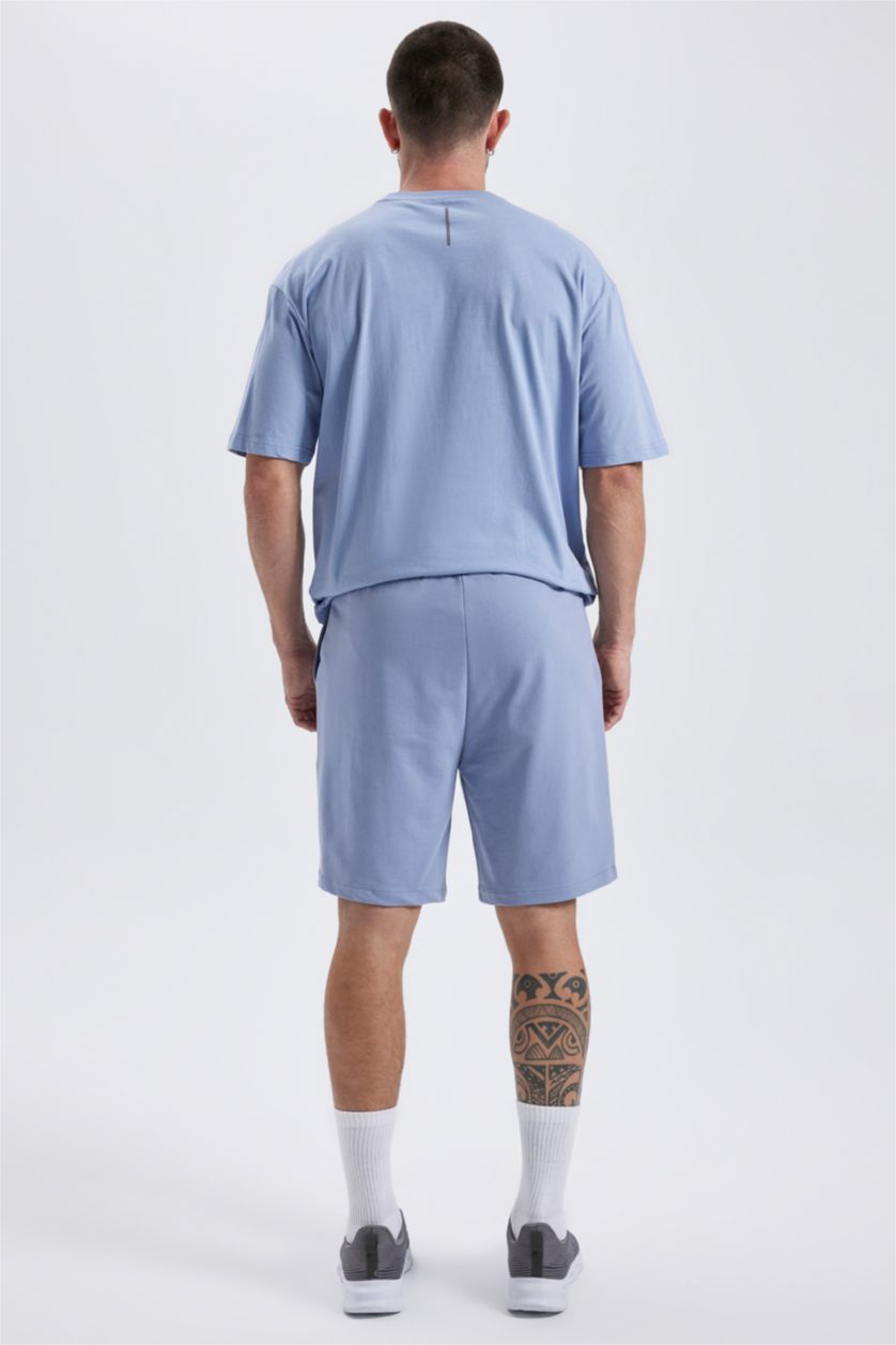 رجالي أزرق شورت سليم فيت بجيوب