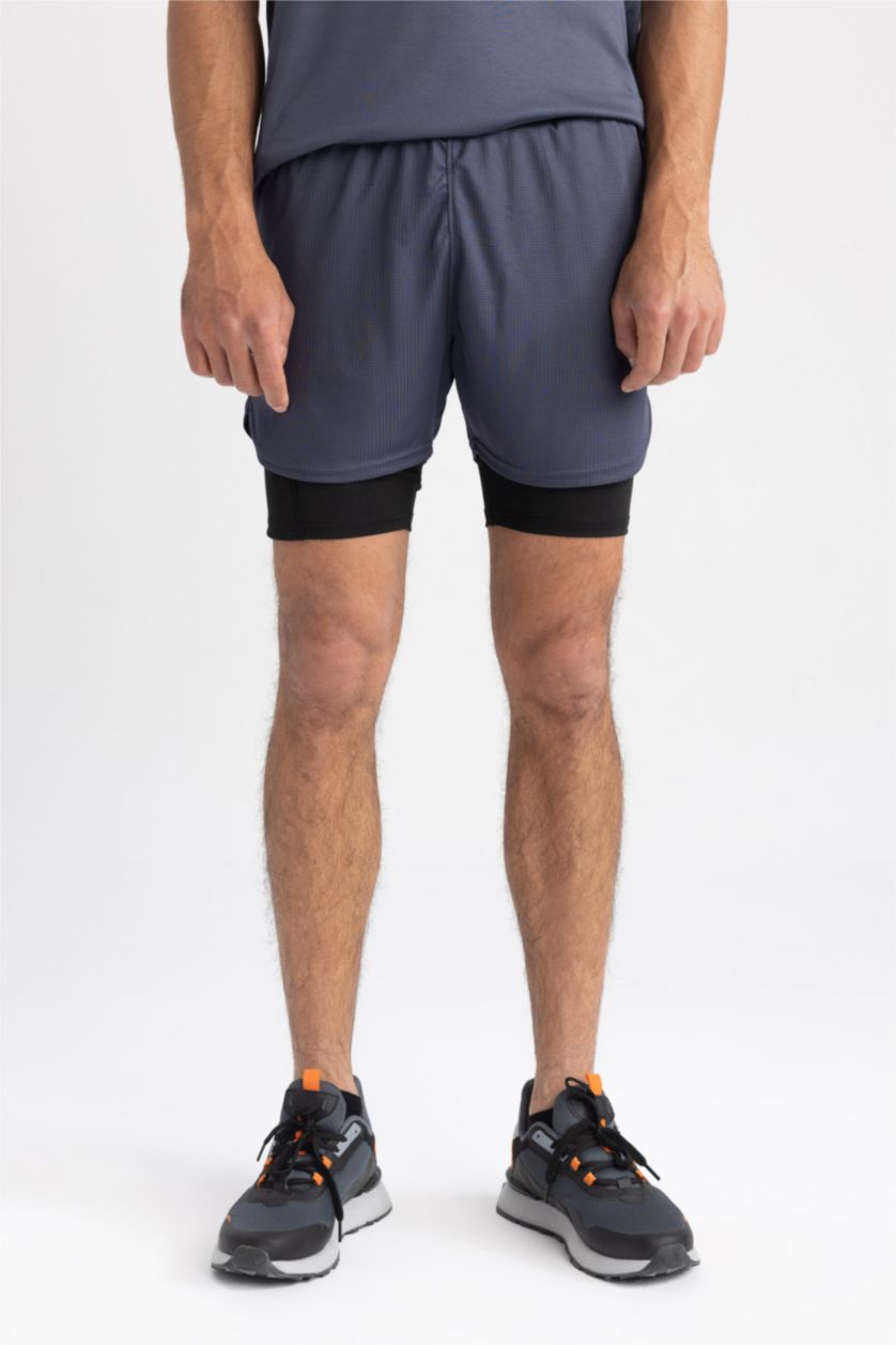 Erkek İndigo DeFactoFit Slim Fit Taytlı Spor Şort