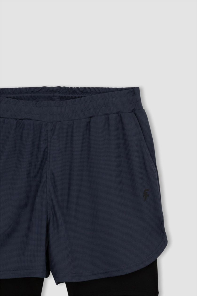 Erkek İndigo DeFactoFit Slim Fit Taytlı Spor Şort