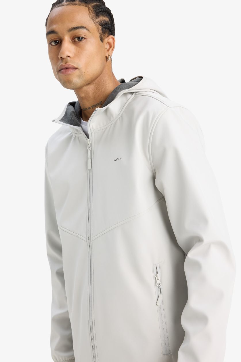 رجالي اللون الحجري جاكيت مطر وتر بروف خفيف سوفتشيل قصة عادية من DeFactoFit