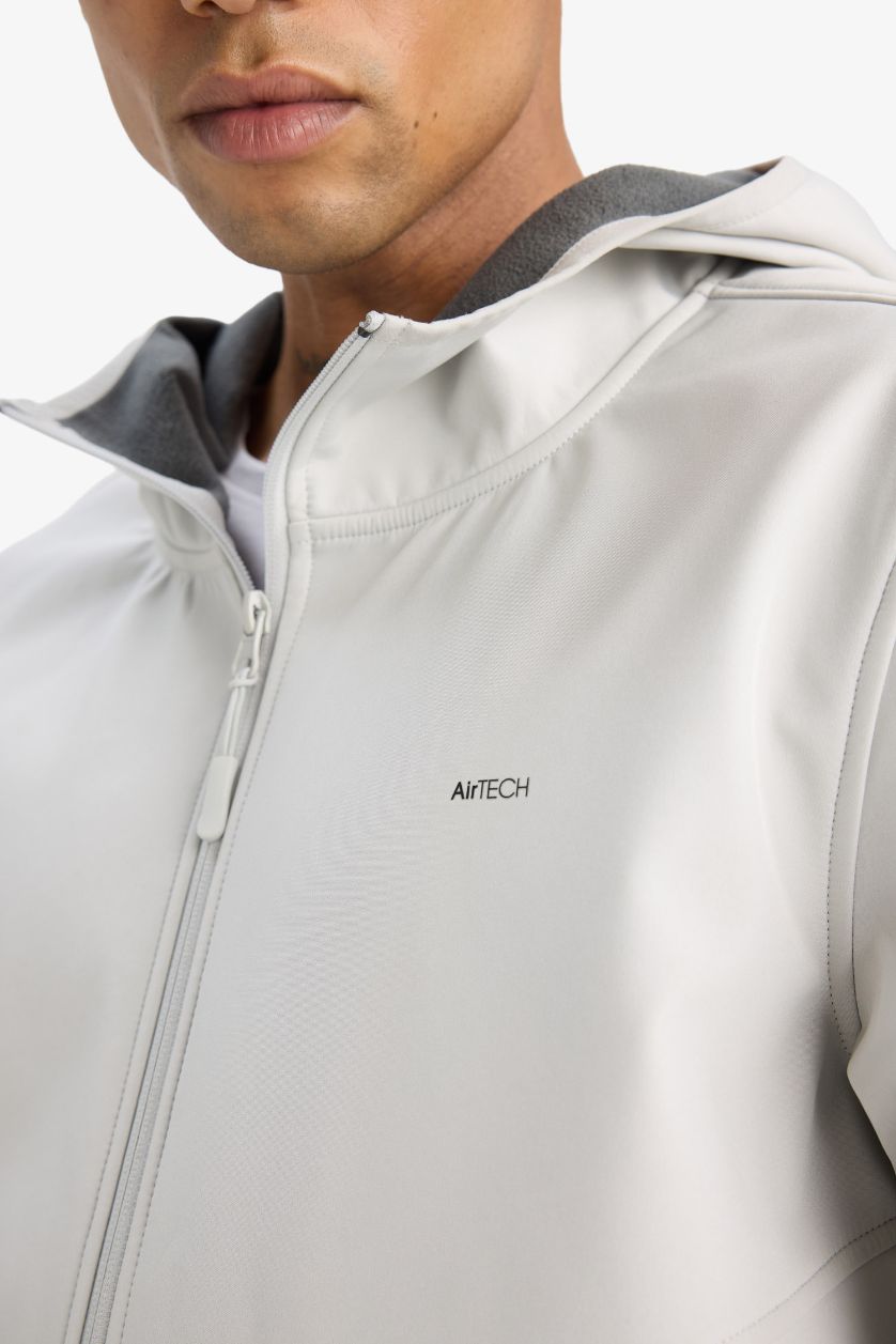 رجالي اللون الحجري جاكيت مطر وتر بروف خفيف سوفتشيل قصة عادية من DeFactoFit