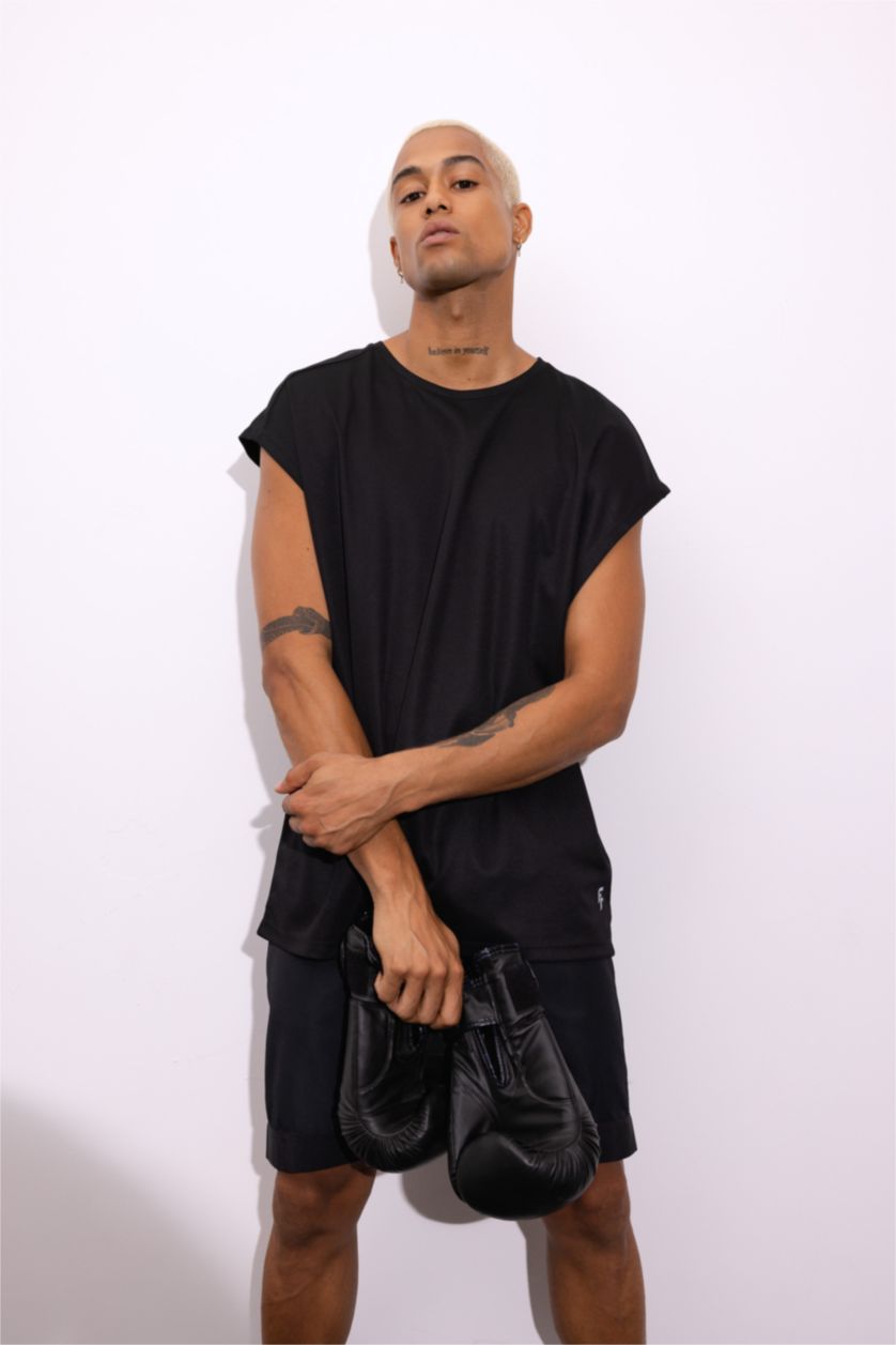 رجالي أسود تيشيرت كت رياضي اوفر سايز بريميوم من DeFactoFit