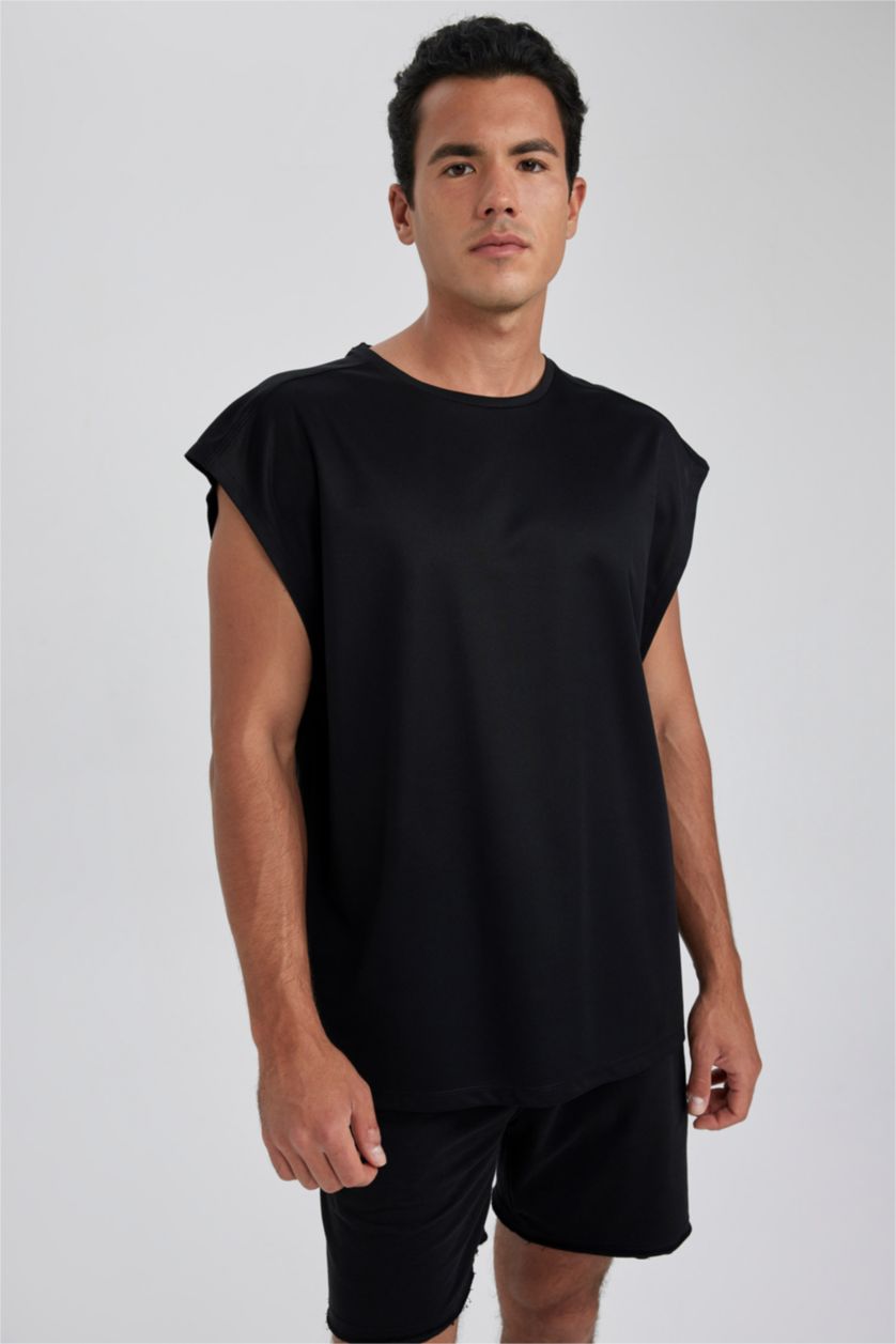 رجالي أسود تيشيرت كت رياضي اوفر سايز بريميوم من DeFactoFit