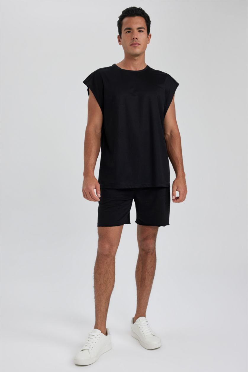 رجالي أسود تيشيرت كت رياضي اوفر سايز بريميوم من DeFactoFit