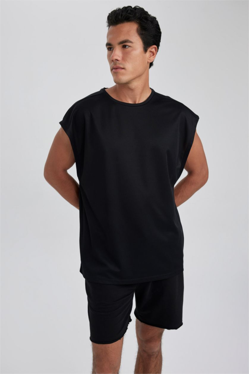 رجالي أسود تيشيرت كت رياضي اوفر سايز بريميوم من DeFactoFit