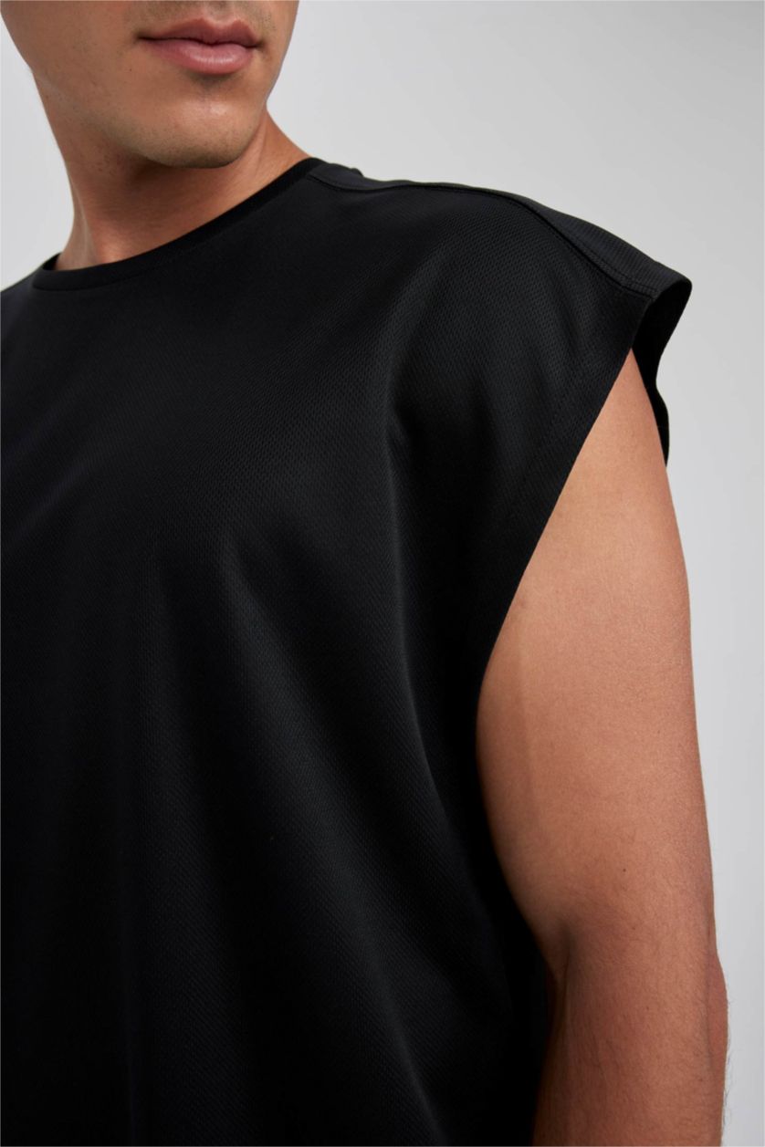 رجالي أسود تيشيرت كت رياضي اوفر سايز بريميوم من DeFactoFit