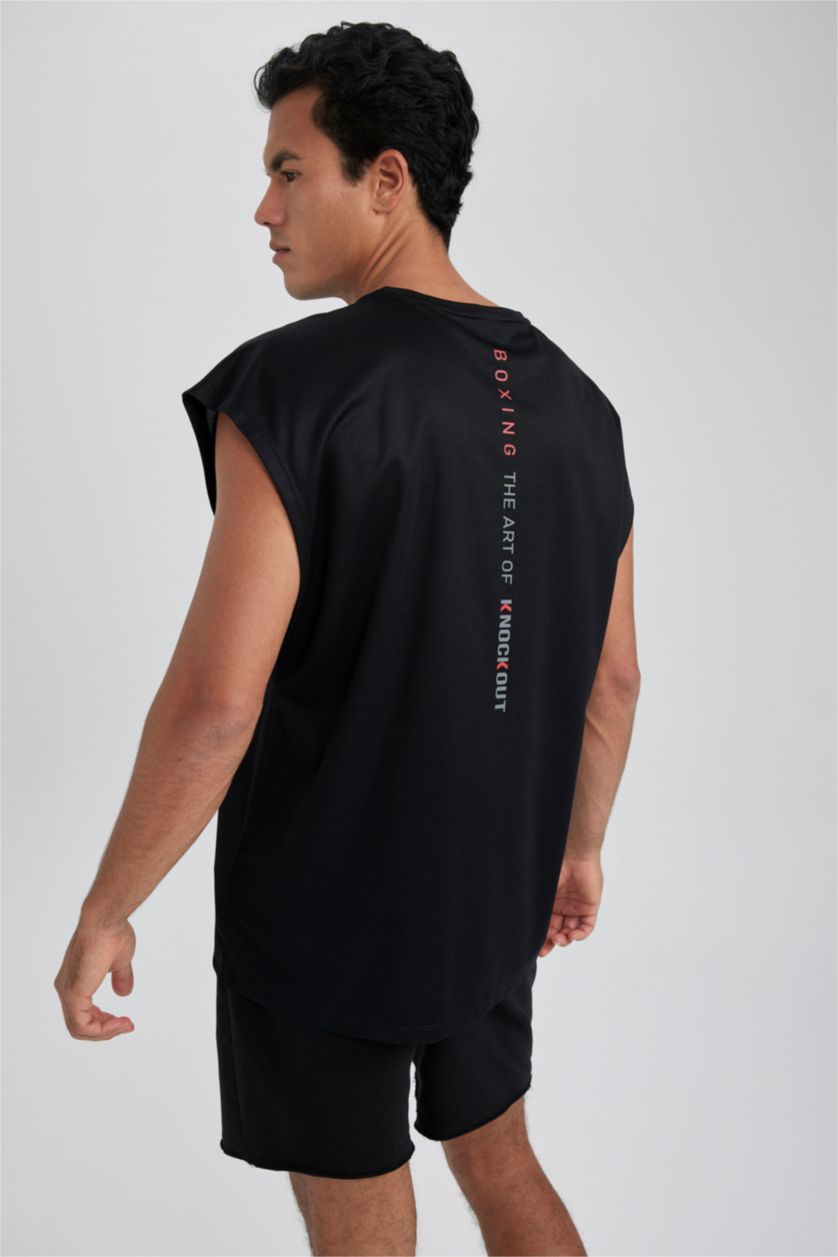 رجالي أسود تيشيرت كت رياضي اوفر سايز بريميوم من DeFactoFit