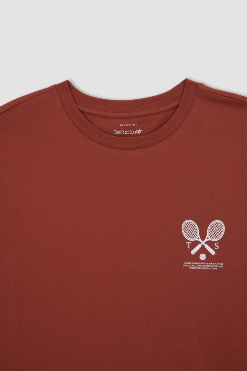 نساء اللون الطوبي تيشيرت واسع قطن بطباعة الشعار ورقبة مستديرة