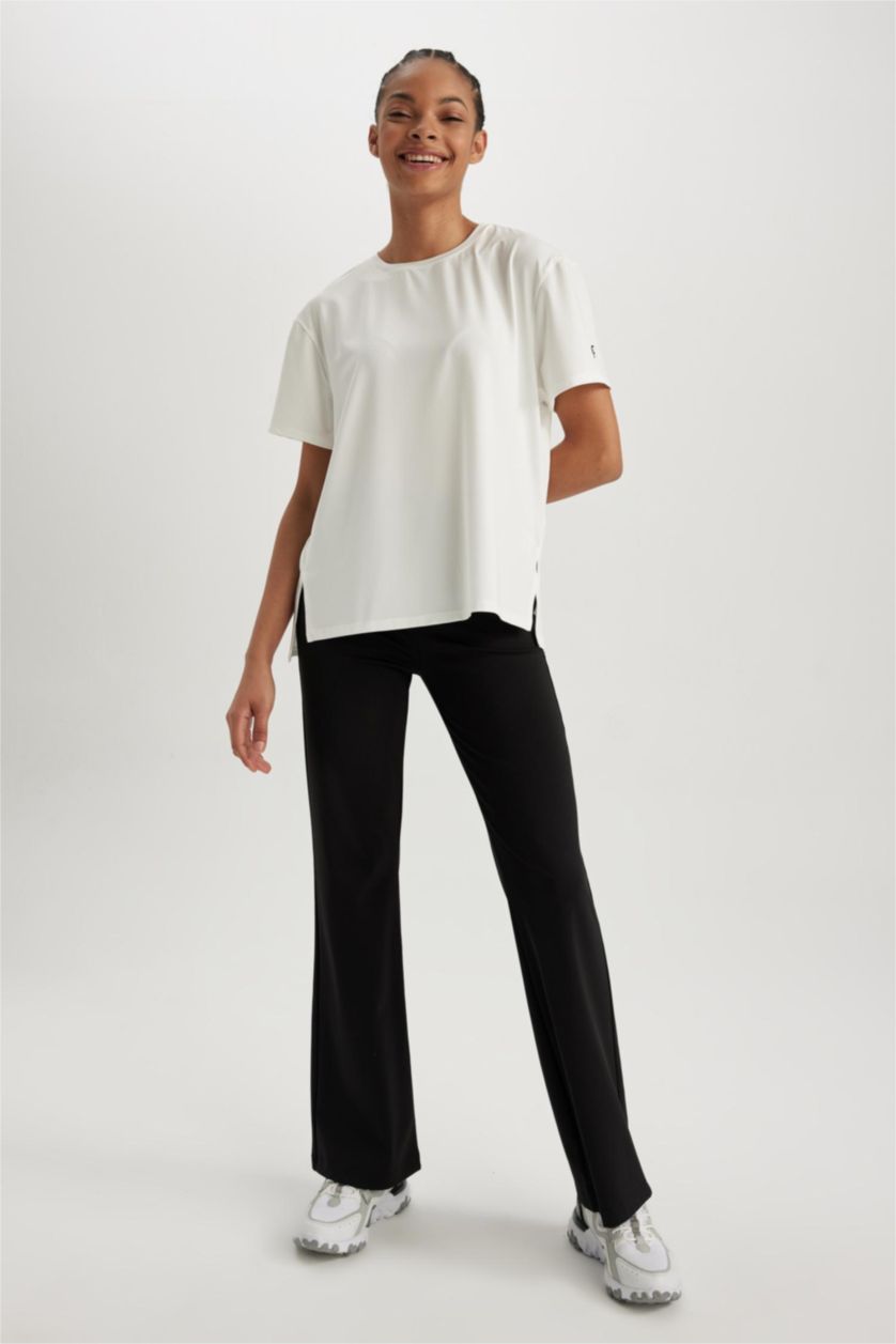 حريمي بيج فاتح تي شيرت رياضي قصة مريحة برقبة مستديرة