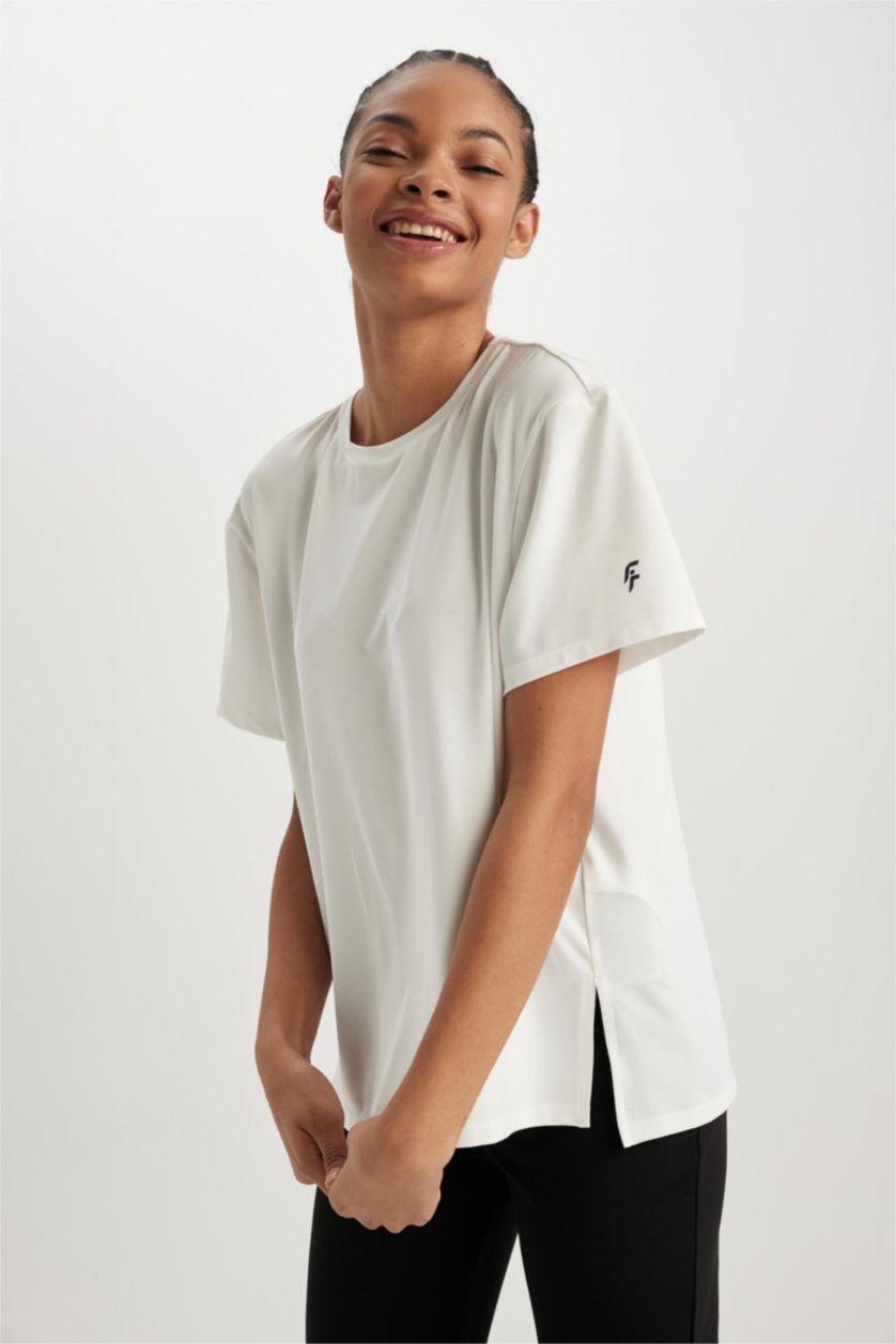 حريمي بيج فاتح تي شيرت رياضي قصة مريحة برقبة مستديرة