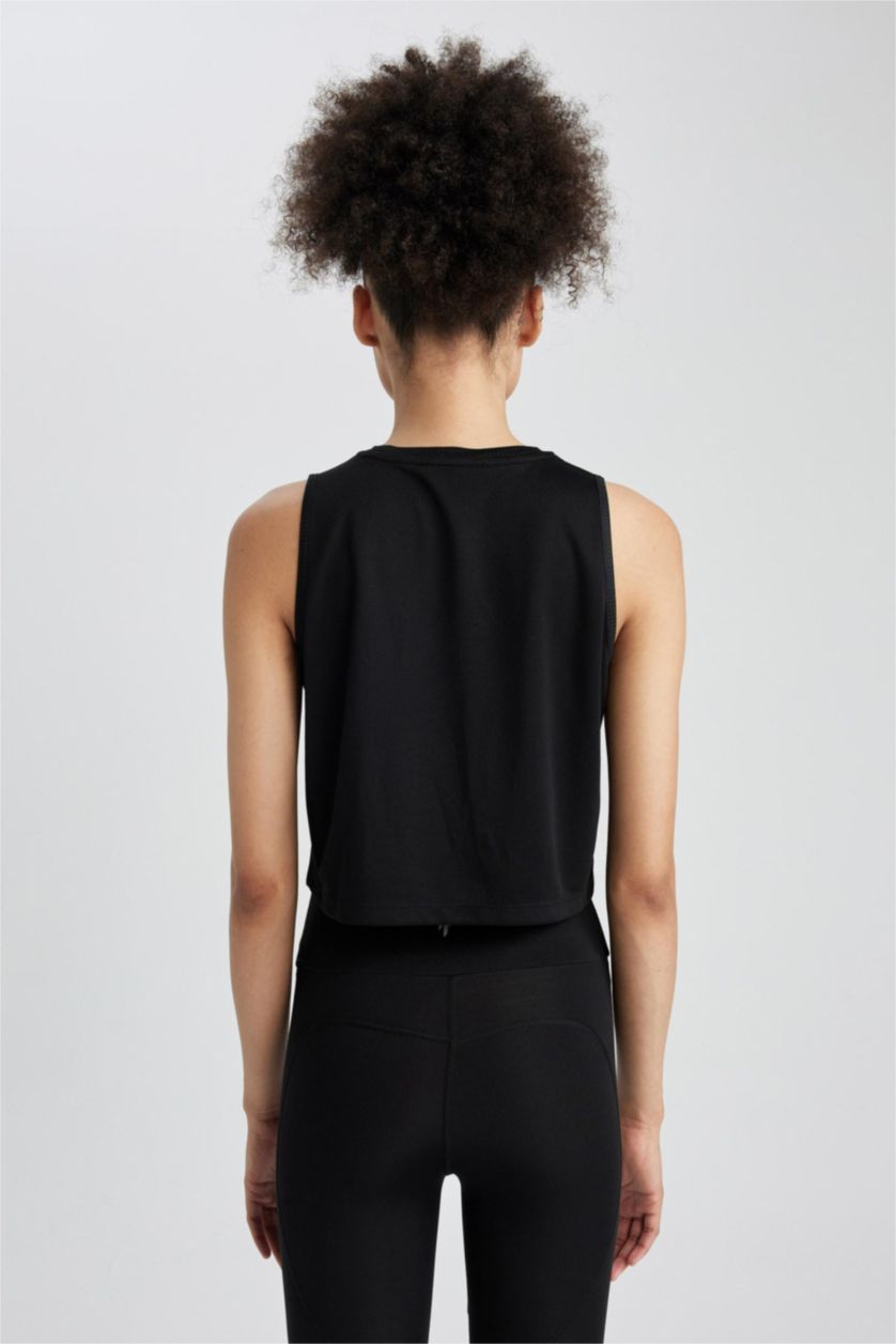 نساء أسود ديباردور قصير توب رياضي