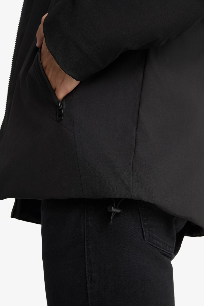 رجالي أسود جاكيت وتر بروف قصة عادية بكابيشون وجيب